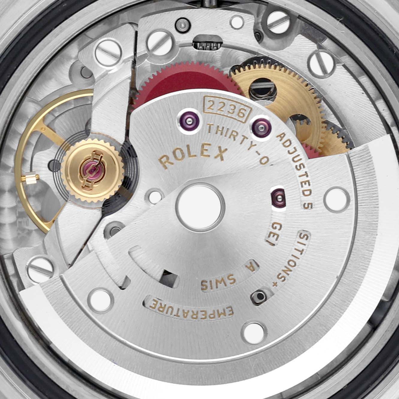 The image shows the intricate inner movement mechanism of a Rolex Datejust 279174 Women's Stainless Steel Pink Dial 279174 Women's Stainless Steel Pink Dial watch from a close-up angle.