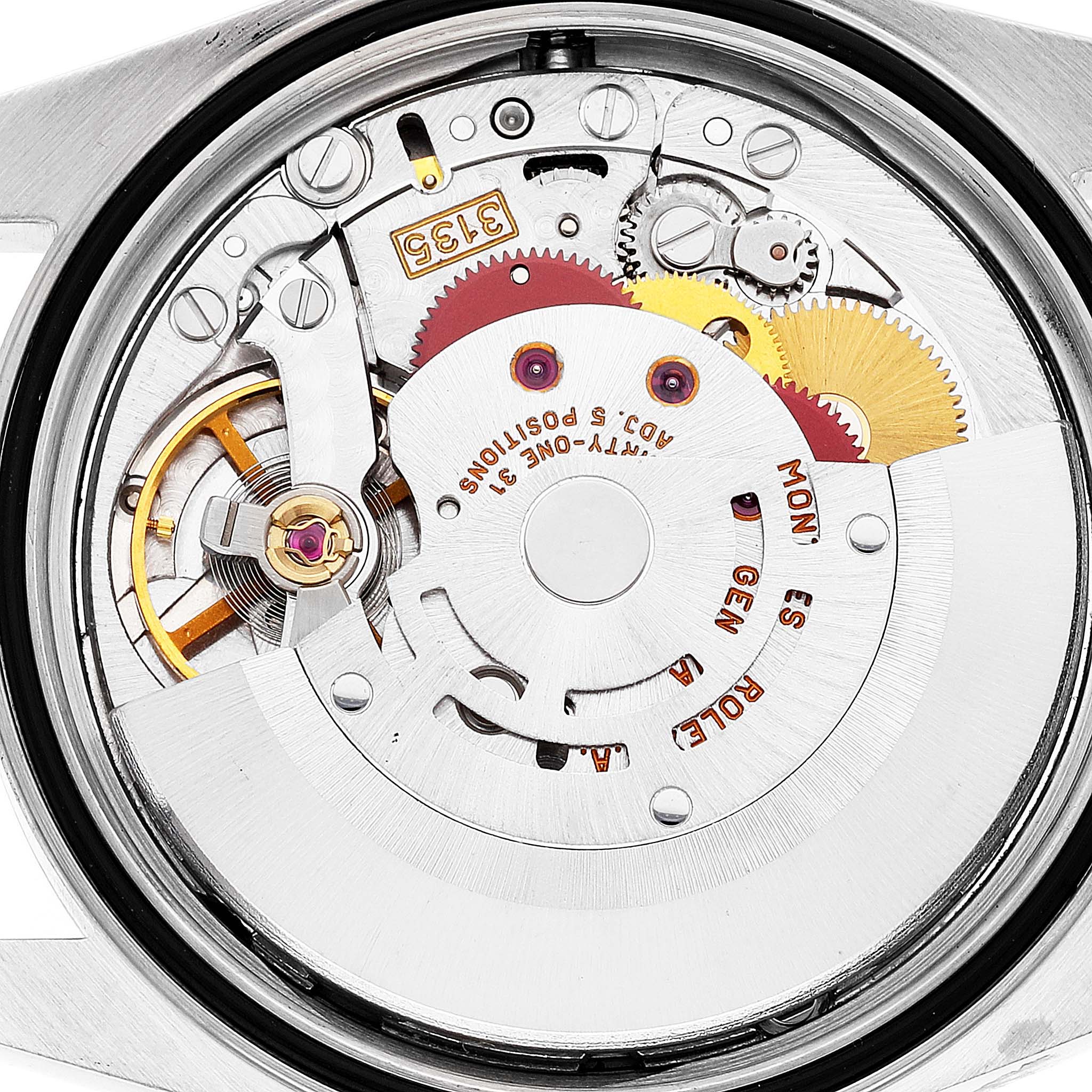 The image shows a close-up of the internal movement mechanism of a Rolex Datejust 16233 Men's Steel and Gold (two tone) Blue Dial 16233 Men's Steel and Gold (two tone) Blue Dial watch.