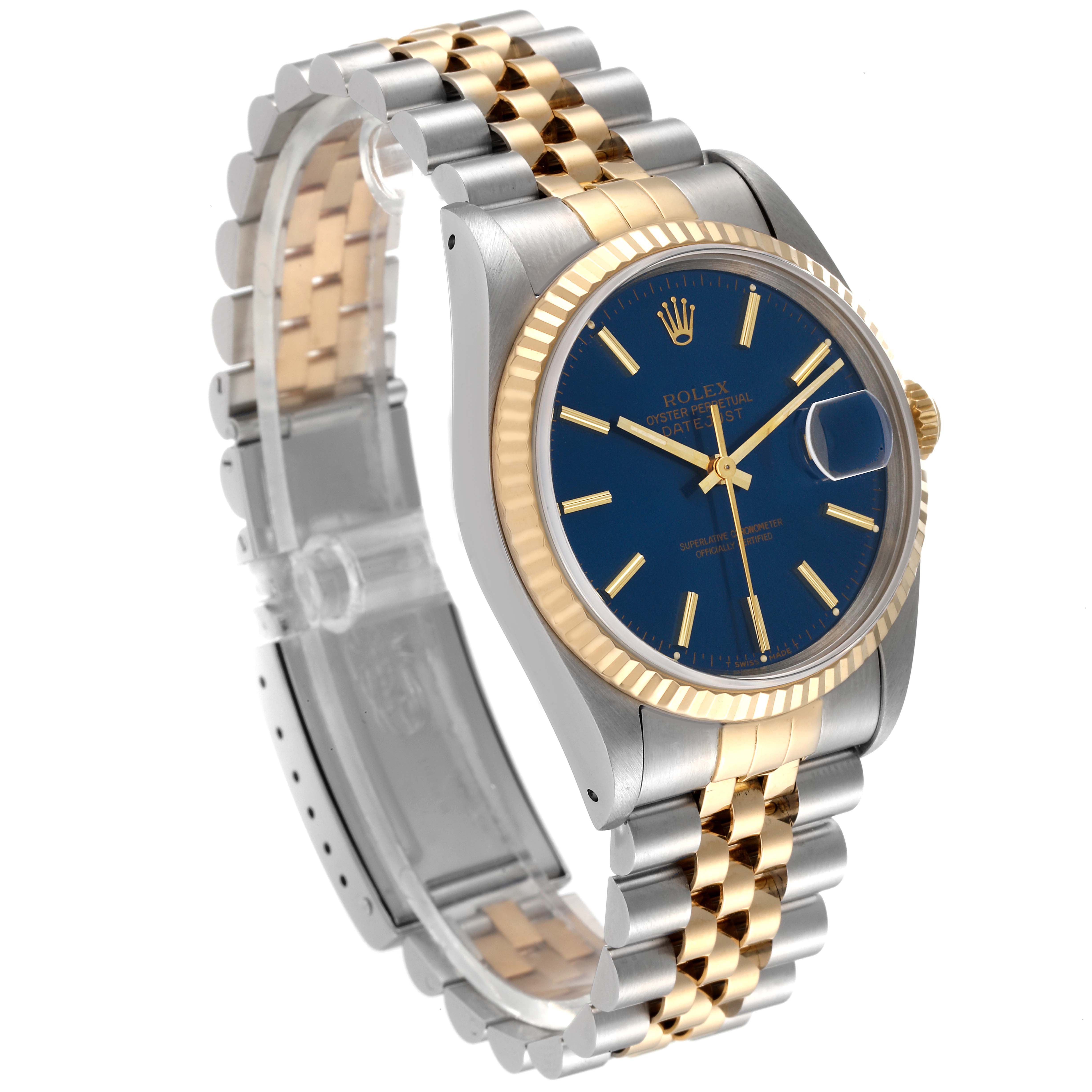 The image shows a Rolex Datejust 16233 Men's Steel and Gold (two tone) Blue Dial 16233 Men's Steel and Gold (two tone) Blue Dial watch at an oblique angle, highlighting its blue dial, fluted bezel, and two-tone Jubilee bracelet.