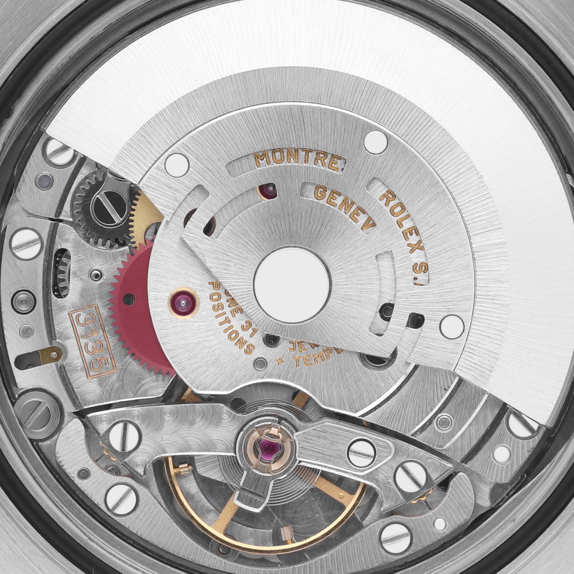 The image shows the movement mechanism of a Rolex Datejust 16233 Men's Steel and Gold (two tone) Black Dial 16233 Men's Steel and Gold (two tone) Black Dial, focusing on intricate gears and components from a back angle.