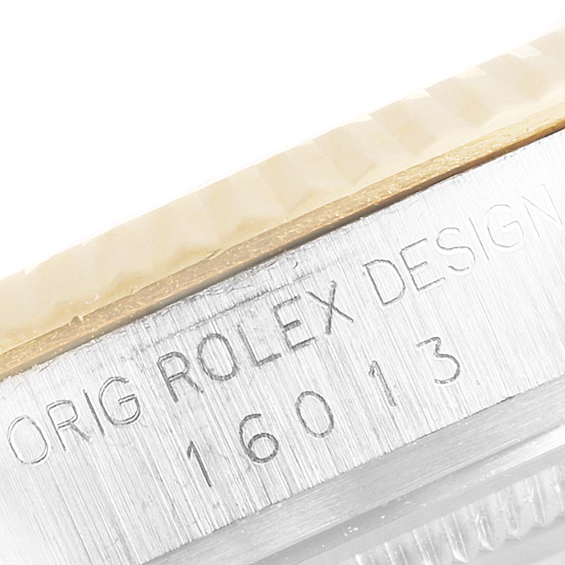 The image shows a close-up of the case side of a Rolex Datejust 16013 Men's Steel and Gold (two tone) Champagne Dial 16013 Men's Steel and Gold (two tone) Champagne Dial model, displaying the model number "16013" and part of the bezel.