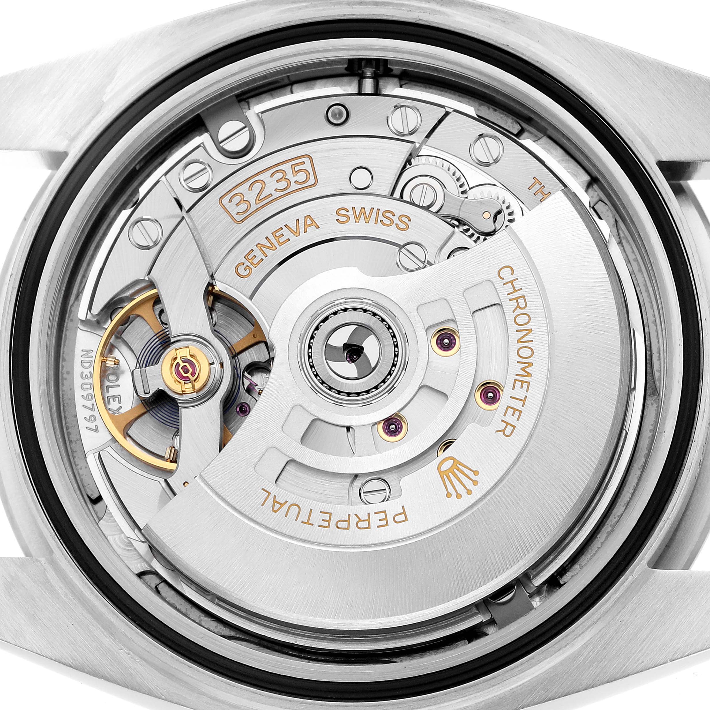 The image shows the back view of a Rolex Datejust 41 126300 Men's Stainless Steel Blue Dial, displaying its intricate movement and rotor.