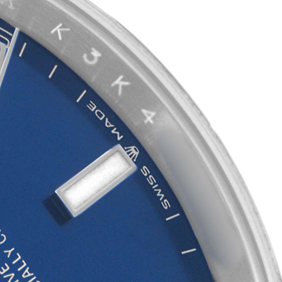 This image shows a close-up of the dial and bezel of a Rolex Datejust 41 126300 Men's Stainless Steel Blue Dial, focusing on the "SWISS MADE" and indices.