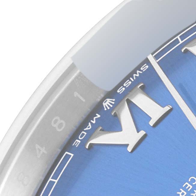 The image shows a portion of the Rolex Datejust 41 126300 Men's Stainless Steel Blue Dial 126300 Men's Stainless Steel Blue Dial watch face, highlighting the edge of the dial with "SWISS MADE" text.