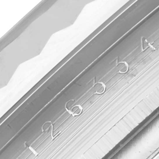 The image shows a close-up of the fluted bezel and edge of the dial on a Rolex Datejust 41 126334 Men's Stainless Steel Grey Dial 126334 Men's Stainless Steel Grey Dial.