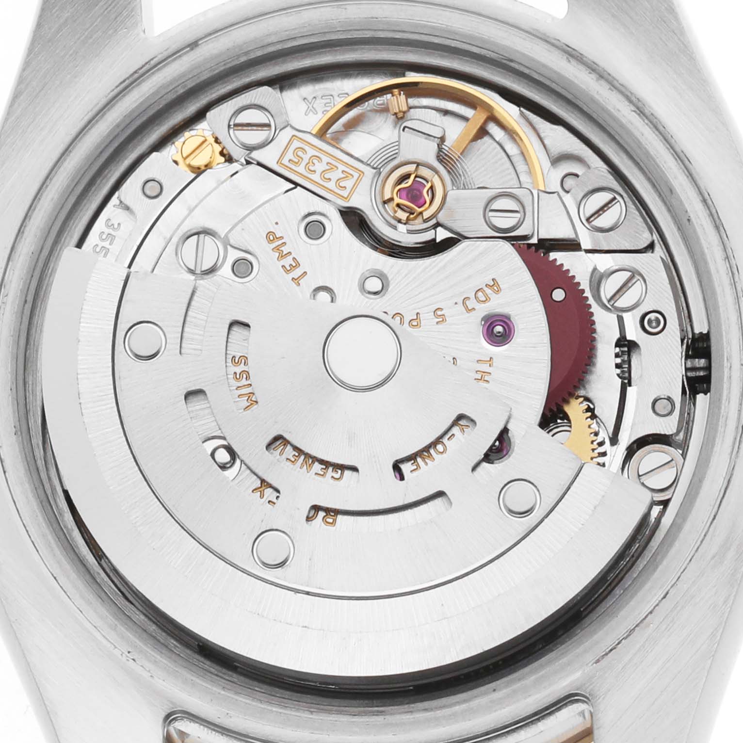 The image shows the movement mechanism of a Rolex Datejust 179383 Women's Steel and Gold (two tone) Champagne Dial watch from a top-down angle, highlighting the rotor and gears.