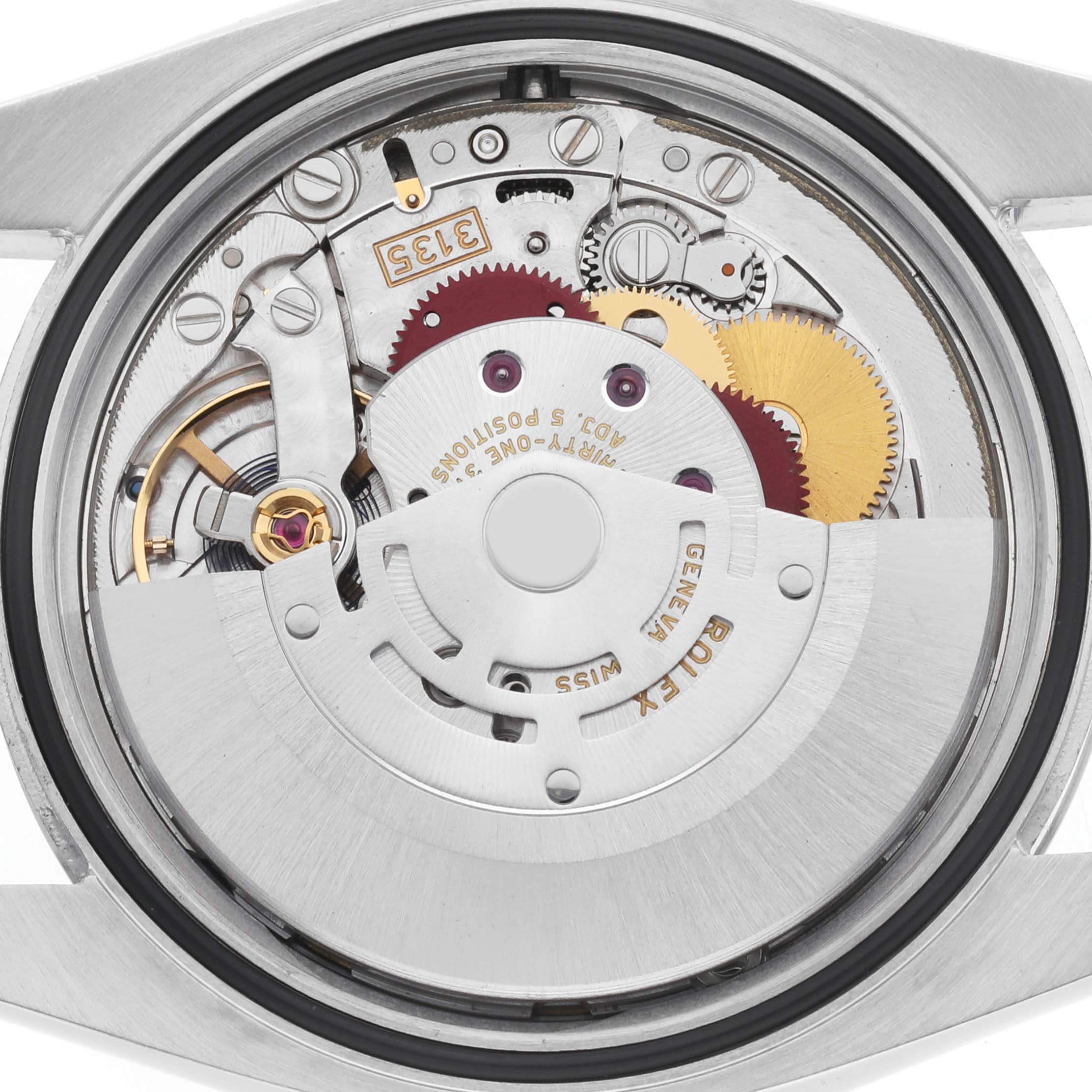 The image shows the movement mechanism of a Rolex Datejust 116200 Men's Stainless Steel Black Dial watch from the back, focusing on the intricate gears and parts.