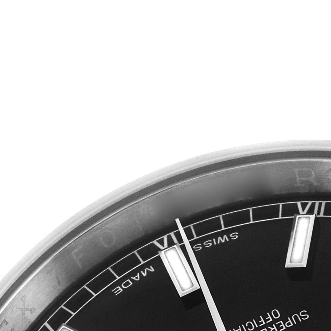 The image shows a close-up of the dial's edge, markers, and hands of a Rolex Datejust 116200 Men's Stainless Steel Black Dial watch, at an angle emphasizing detail.