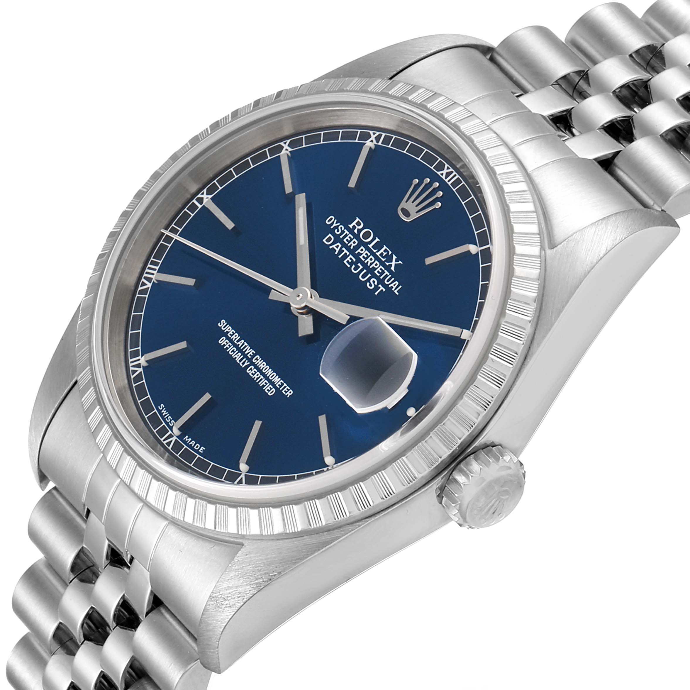 This image shows a side angle view of a Rolex Datejust 16220 Men
s Stainless Steel Blue Dial 16220 Men
s Stainless Steel Blue Dial watch, highlighting its blue dial, fluted bezel, and Jubilee bracelet.