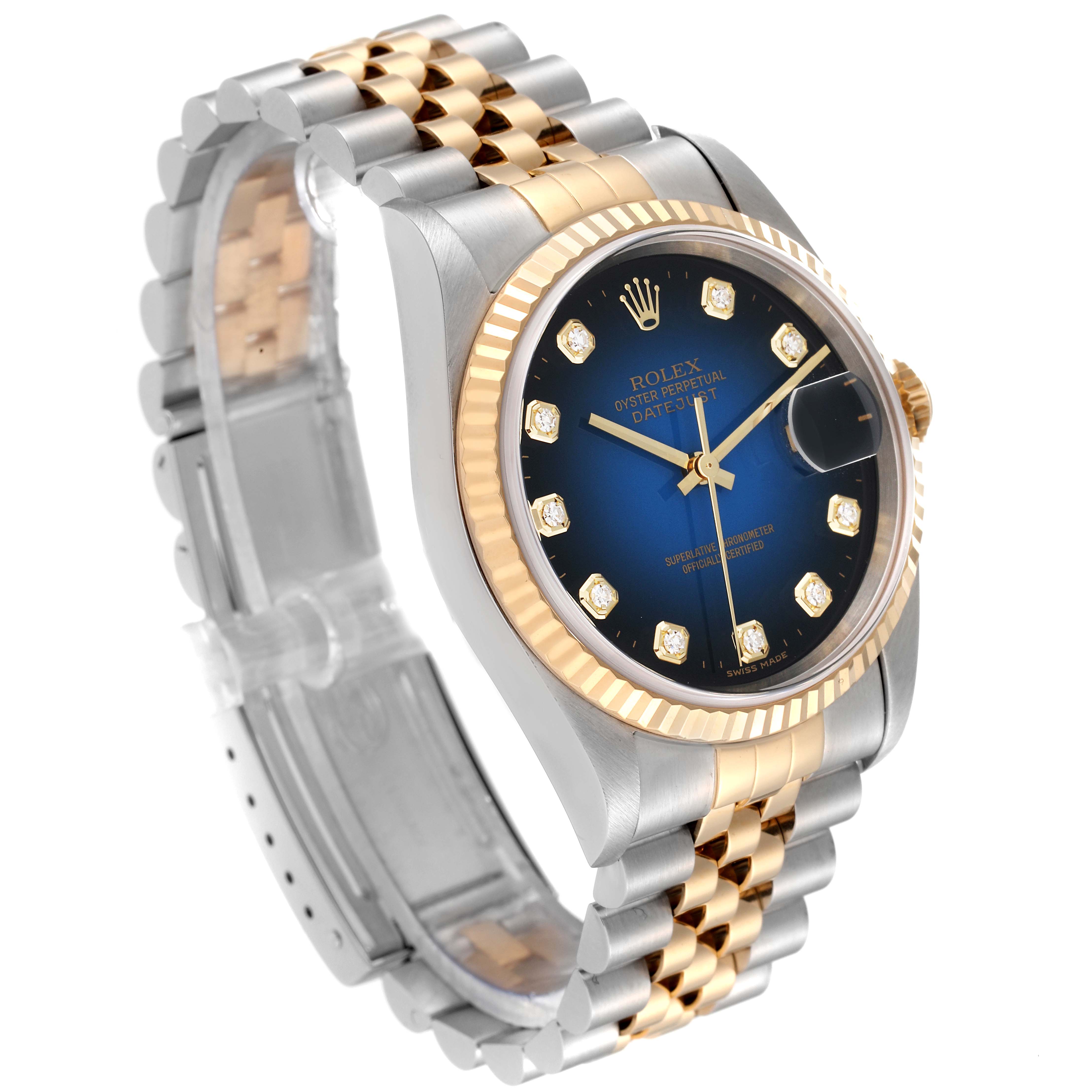 This image shows a Rolex Datejust 16233 Men's Steel and Gold (two tone) Blue Dial 16233 Men's Steel and Gold (two tone) Blue Dial watch at a three-quarter angle, highlighting the blue dial, diamond indices, and two-tone bracelet.