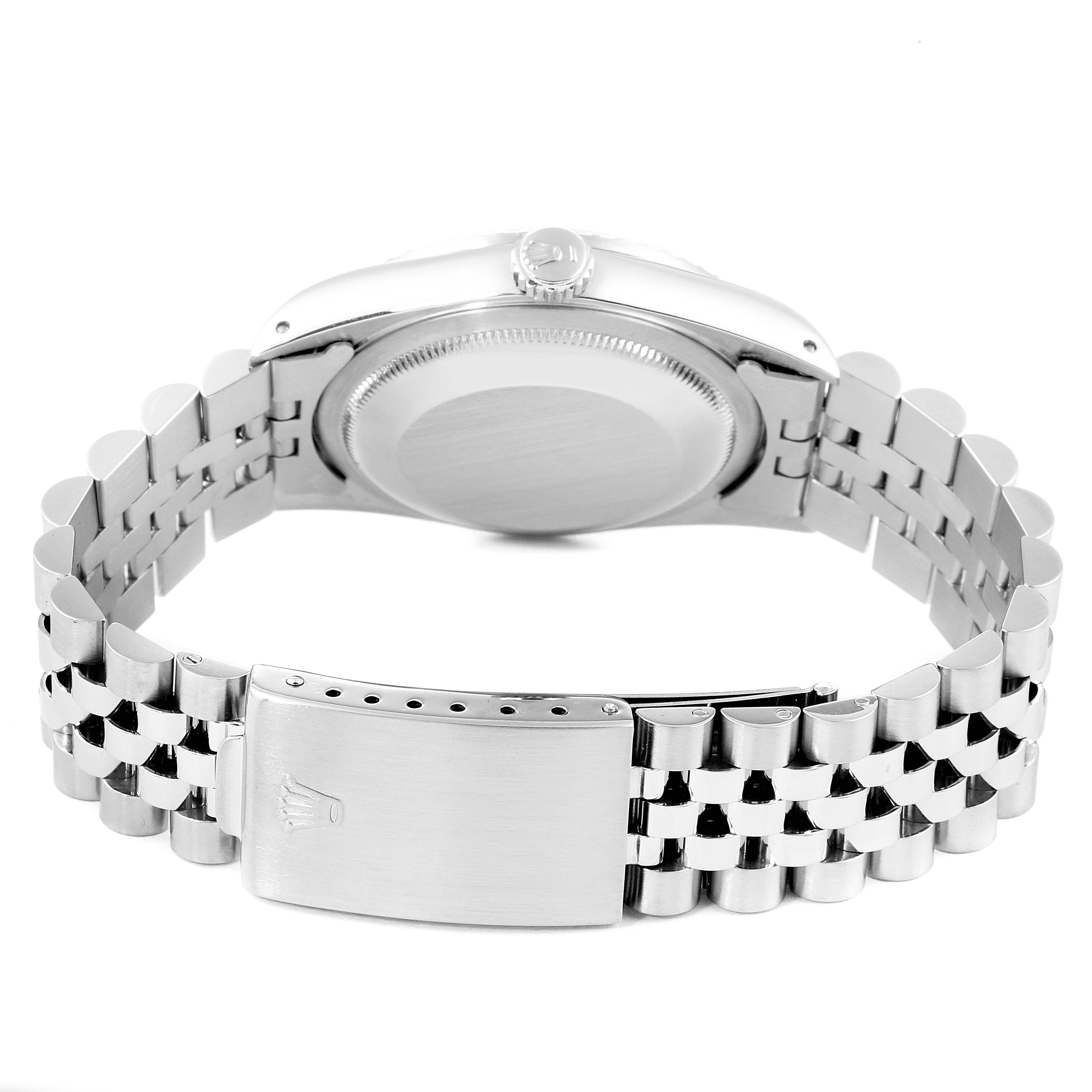 The image shows the back view of a Rolex Datejust 16220 Men
s Stainless Steel Grey Dial 16220 Men
s Stainless Steel Grey Dial watch, highlighting its case back and Jubilee bracelet with clasp.