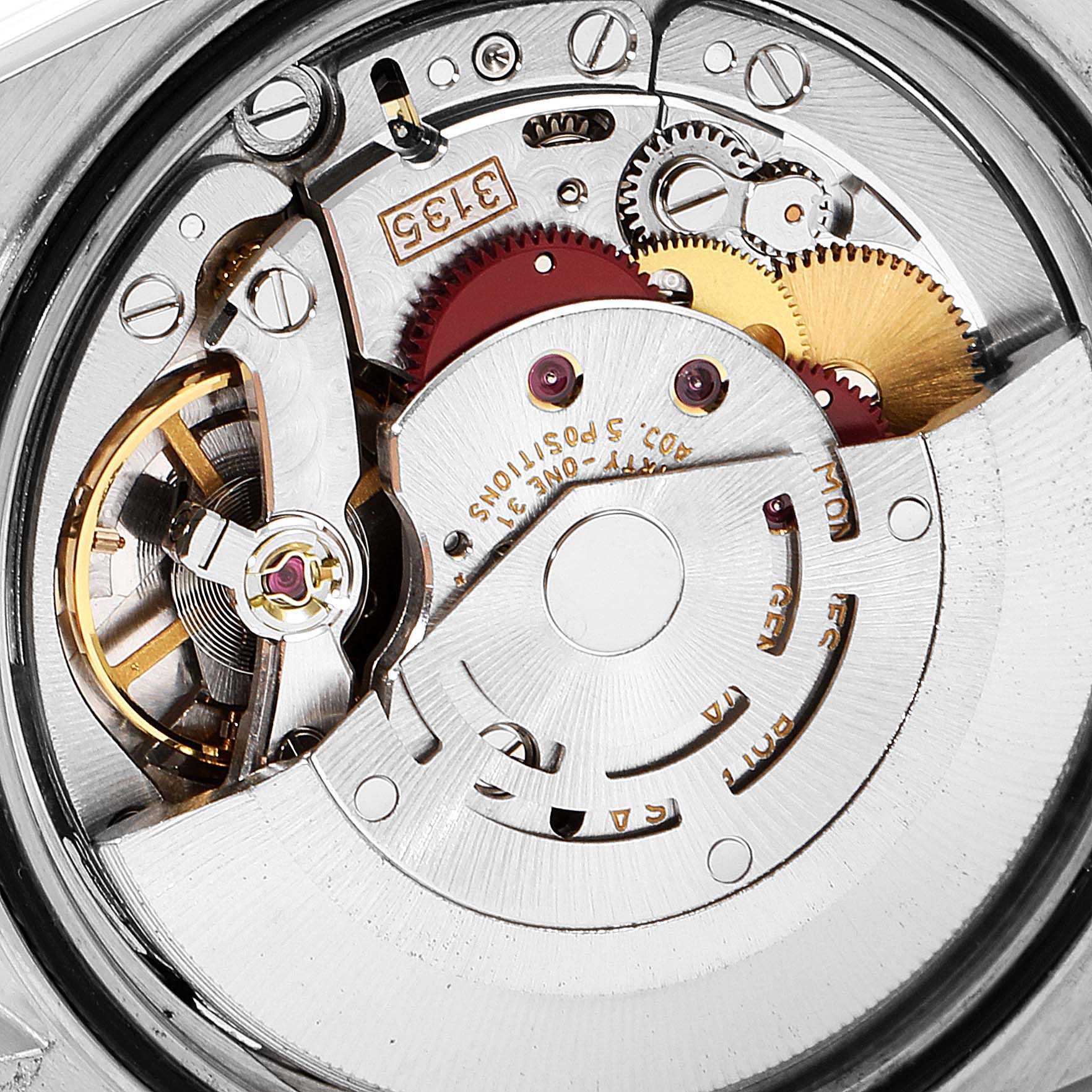 Close-up of the Rolex Datejust 16220 Men
s Stainless Steel Grey Dial 16220 Men
s Stainless Steel Grey Dial movement mechanism, showcasing gears and intricate internal components from the backside.