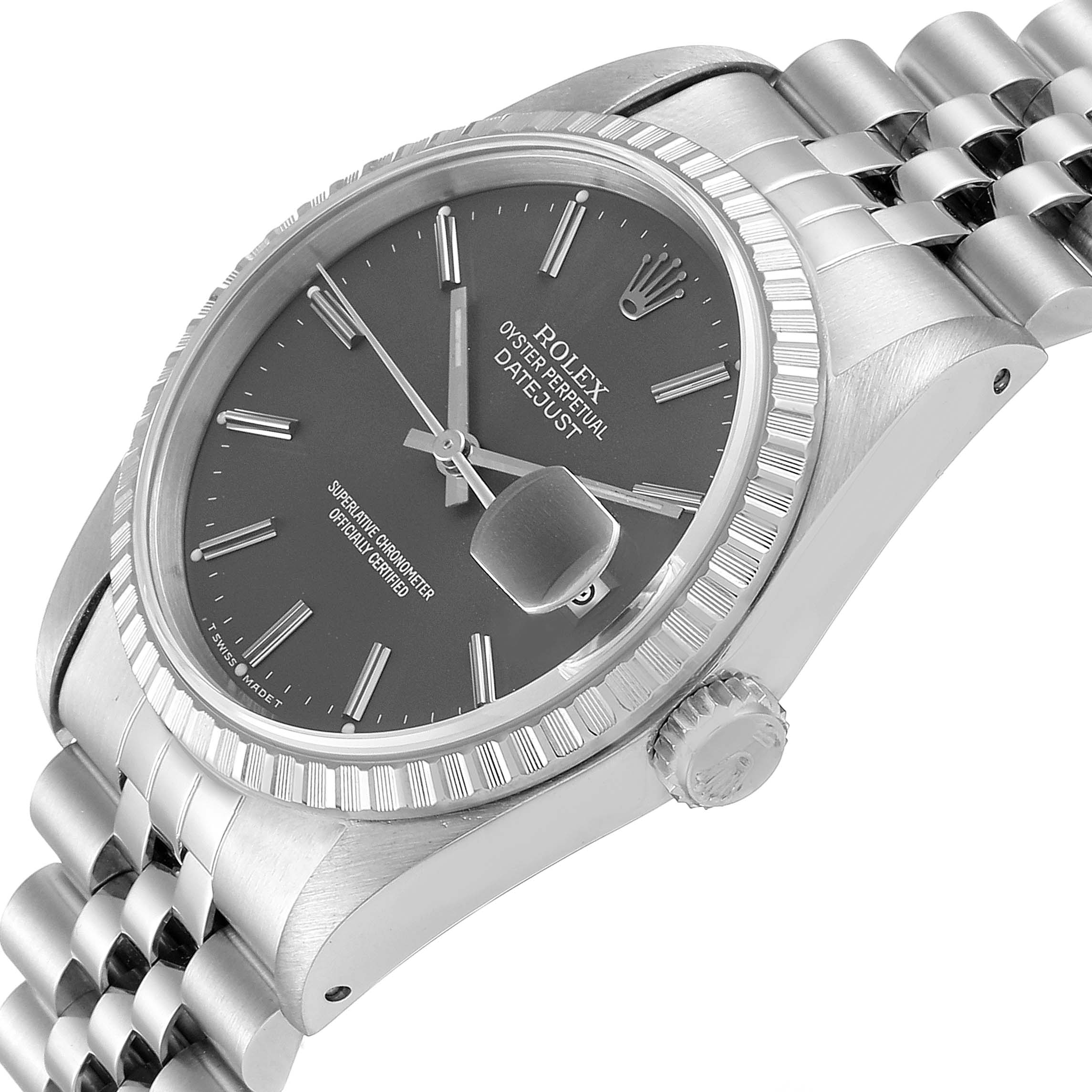 The image shows a close-up angled view of a Rolex Datejust 16220 Men
s Stainless Steel Grey Dial 16220 Men
s Stainless Steel Grey Dial watch showcasing the dial, bezel, crown, and part of the bracelet.