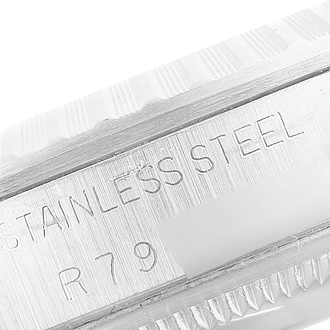 The image shows a close-up of the stainless steel casing and model engraving on a Rolex Datejust 16220 Men
s Stainless Steel Grey Dial 16220 Men
s Stainless Steel Grey Dial watch.