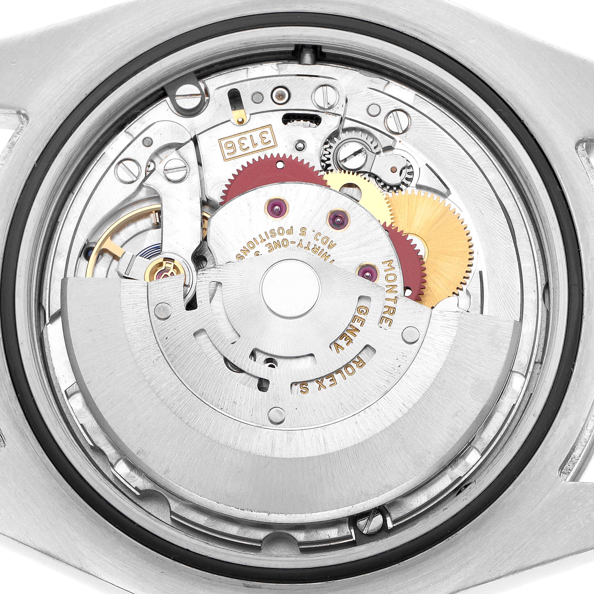 The image shows the movement of a Rolex Datejust 41 116334 Men's Stainless Steel Blue Dial watch from a back angle, highlighting its intricate mechanism.