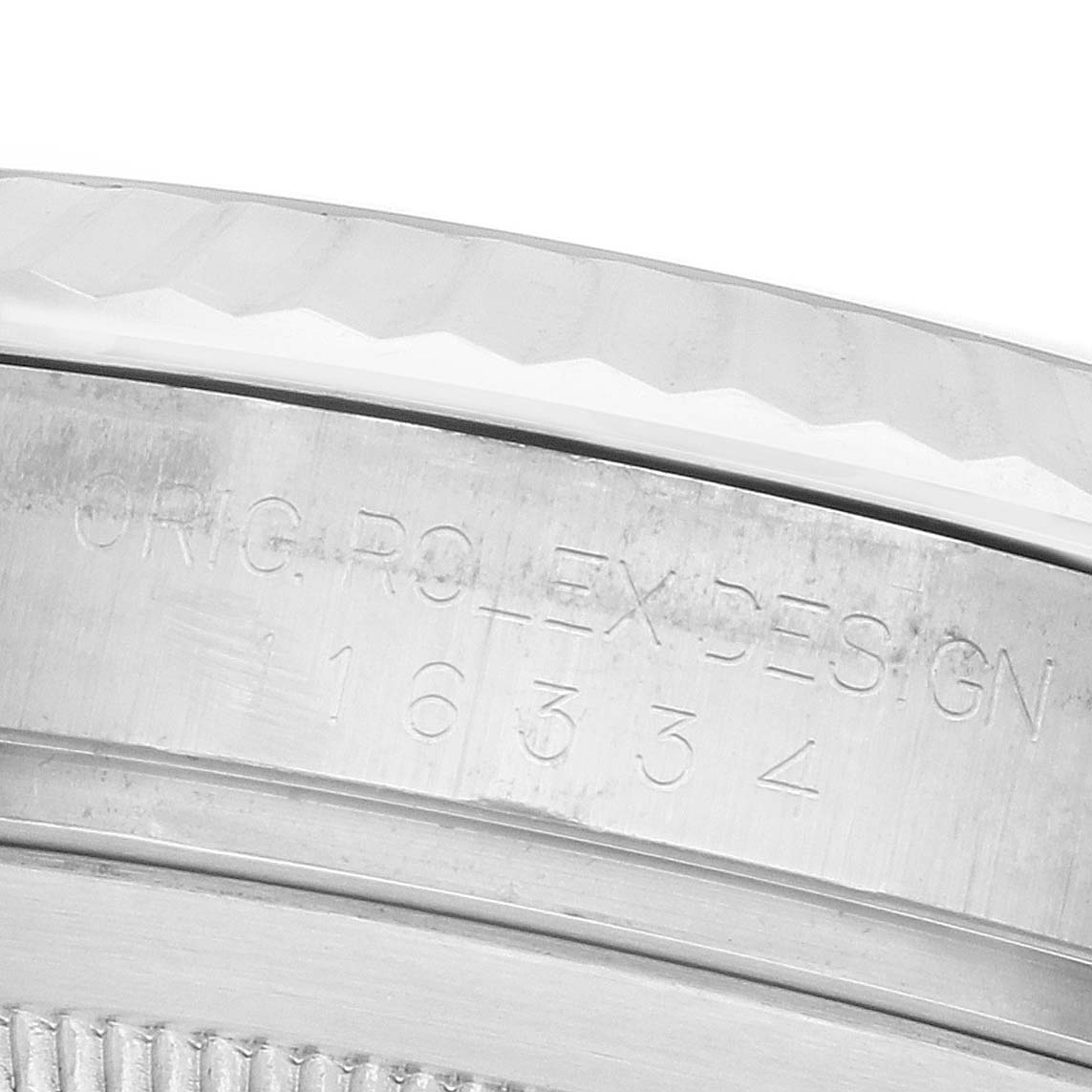 The image shows the side profile of a Rolex Datejust 41 116334 Men's Stainless Steel Silver Dial, highlighting the engraved case design number.