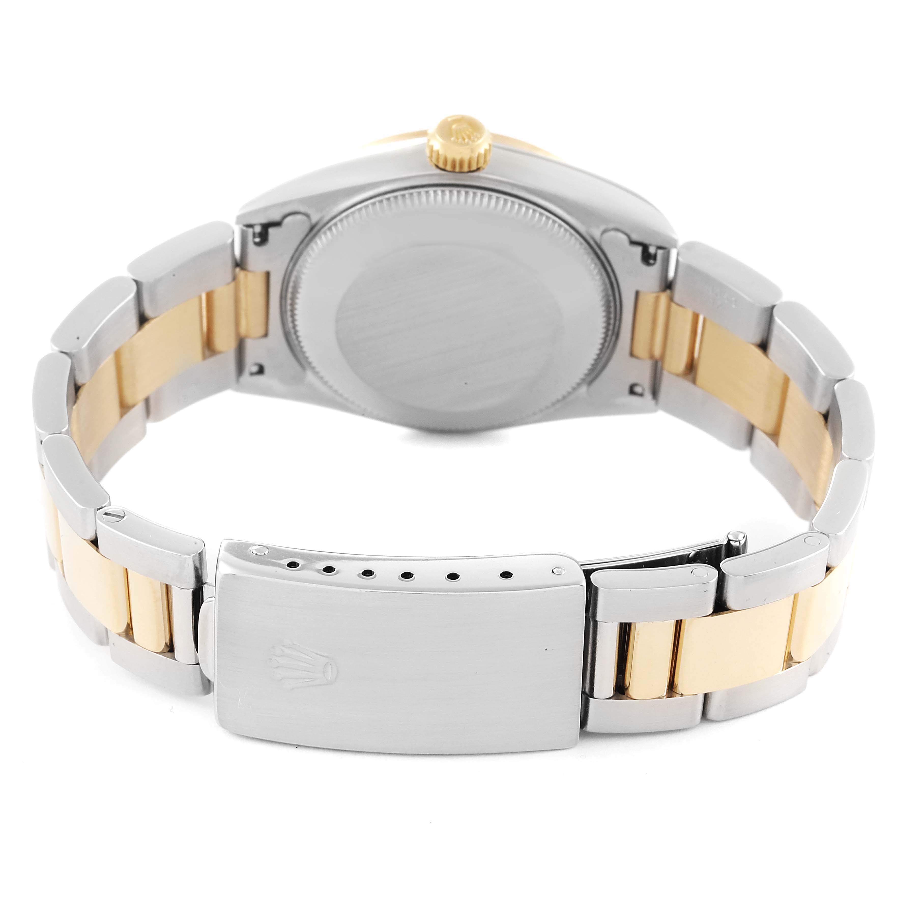 The image shows the back, clasp, and bracelet of a Mid-Size Rolex watch.