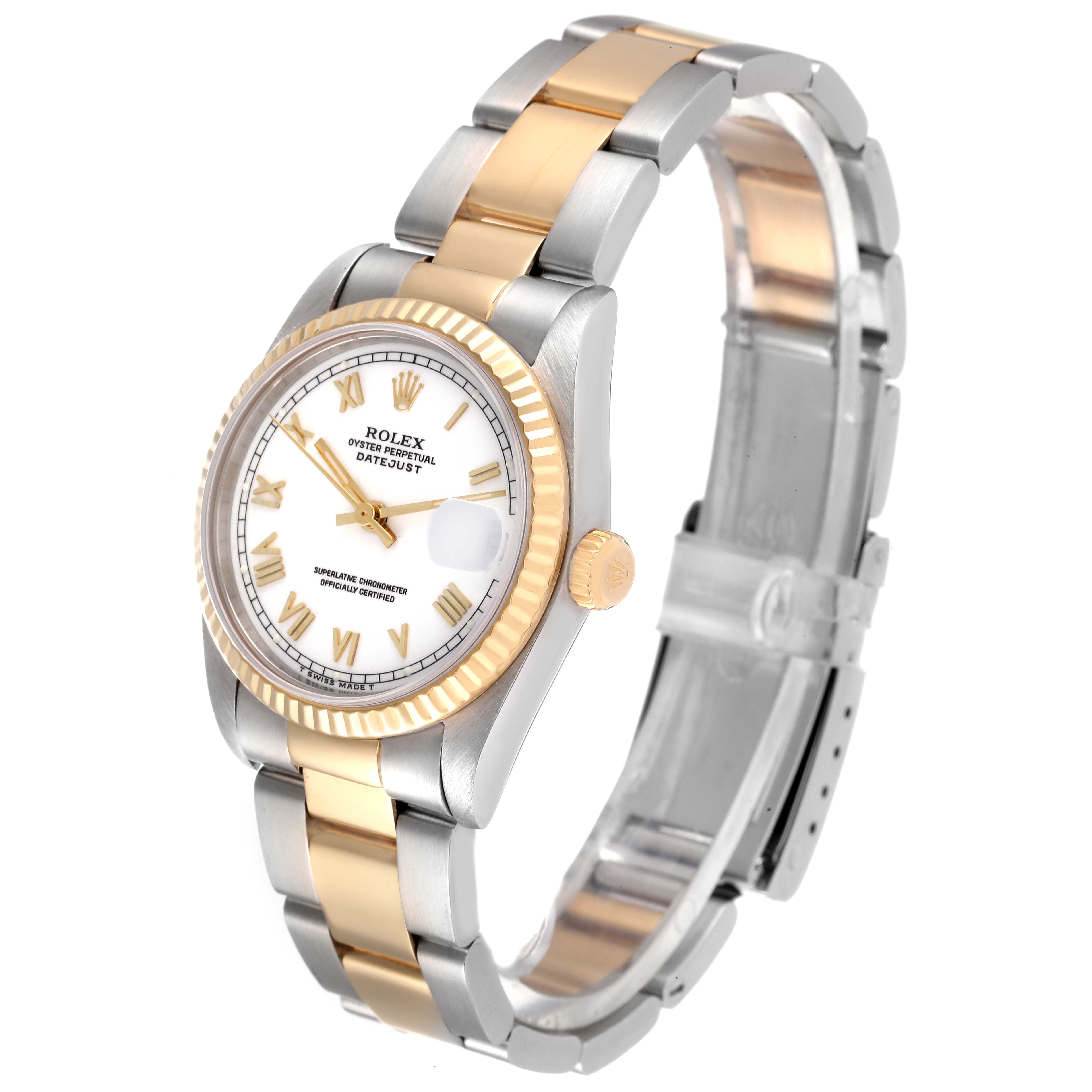 The Rolex Mid-Size 78273 Women
s Steel and Gold (two tone) White Dial 78273 Women
s Steel and Gold (two tone) White Dial Datejust watch is shown at a slight angle, highlighting its two-tone bracelet, white dial, and gold fluted bezel.