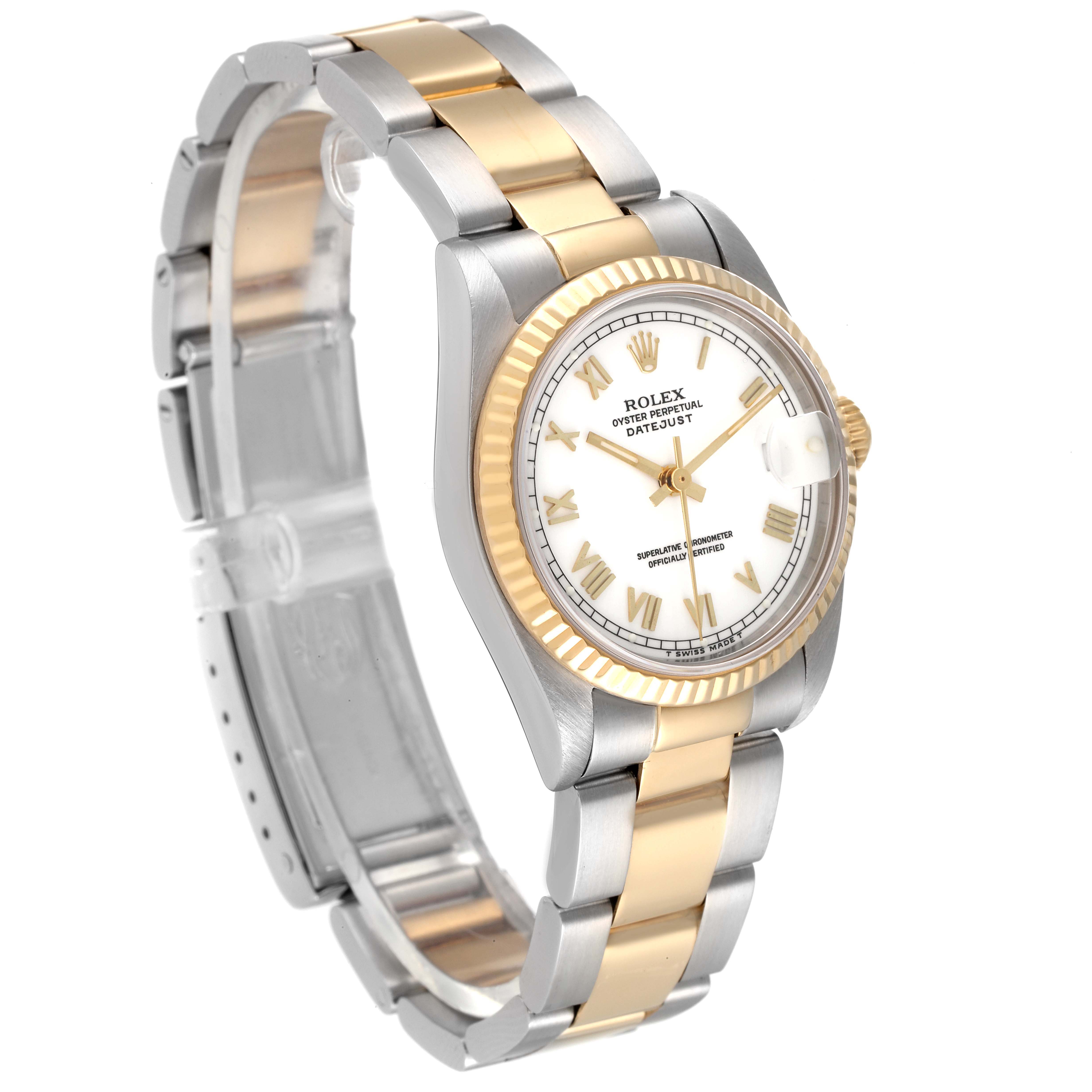The image shows a Rolex Mid-Size 78273 Women
s Steel and Gold (two tone) White Dial 78273 Women
s Steel and Gold (two tone) White Dial Oyster Perpetual Datejust watch angled to display its face, strap, and crown.