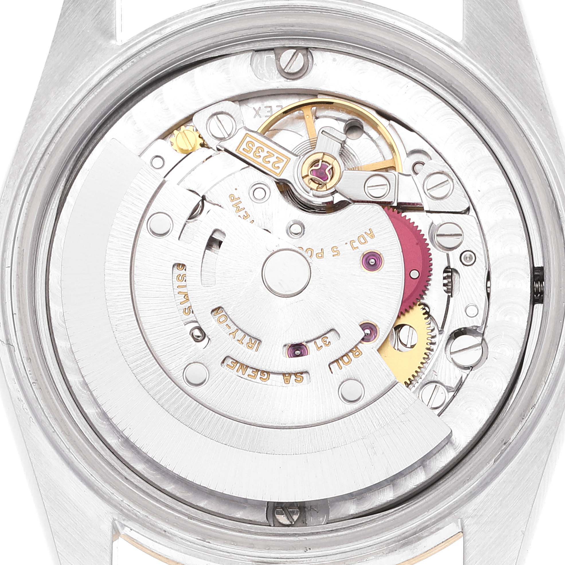 The image shows the internal mechanical movement of a Mid-Size Rolex watch from the back side.