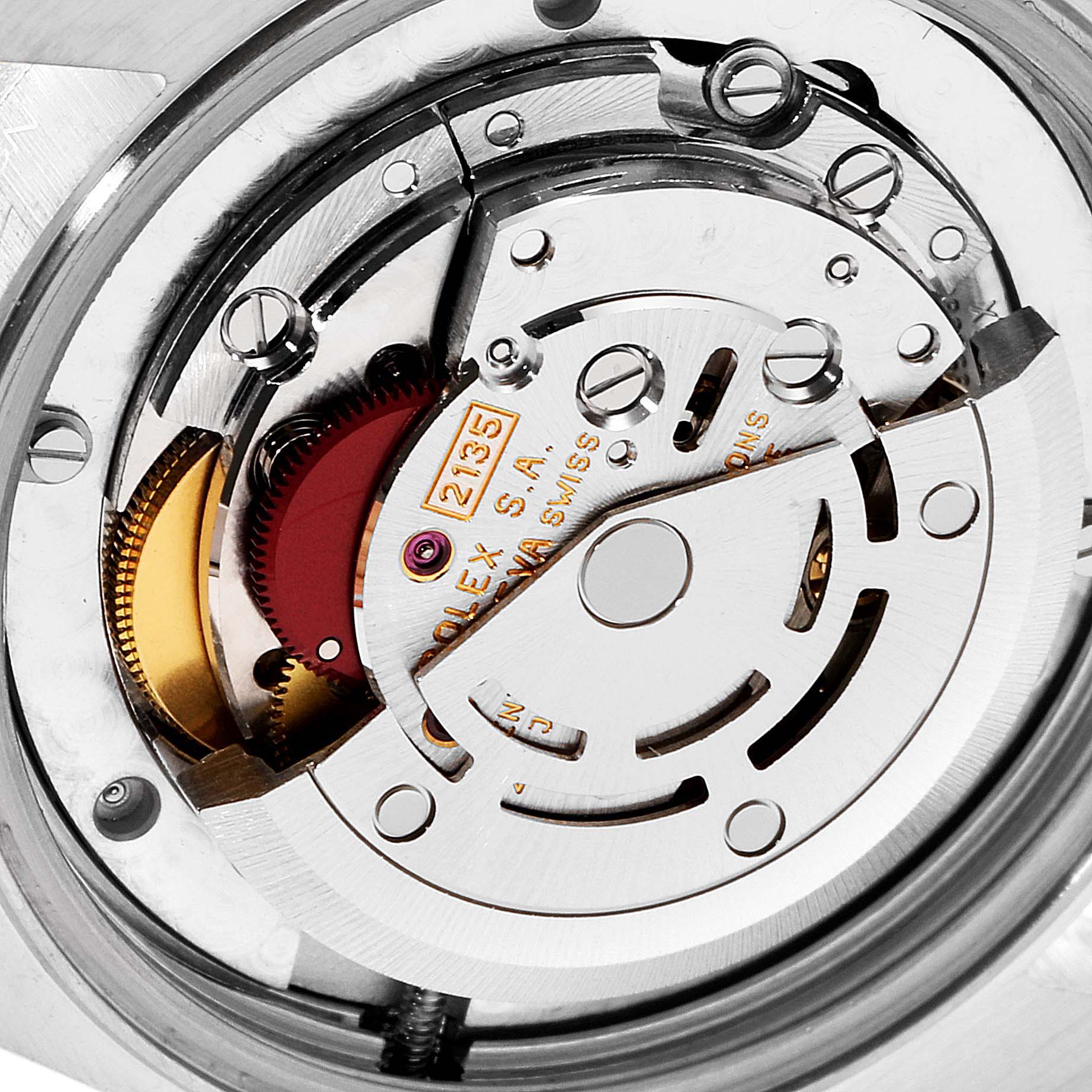 This image shows a close-up of the movement mechanism inside a Mid-Size Rolex watch, viewed from the back.