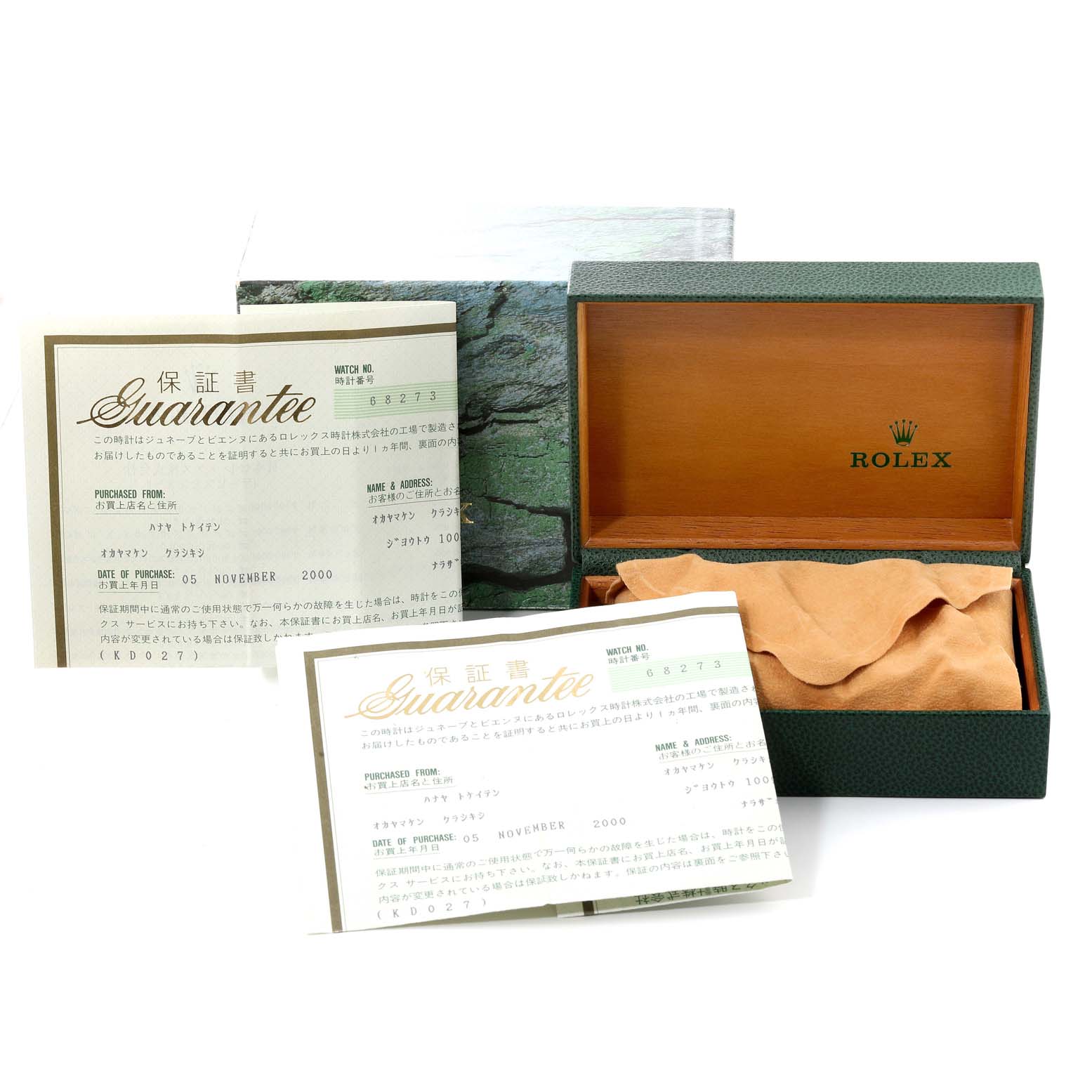 The image shows an open Rolex Mid-Size 68273 Women
s Steel and Gold (two tone) Black Dial 68273 Women
s Steel and Gold (two tone) Black Dial watch box with guarantee cards and a protective cloth inside.