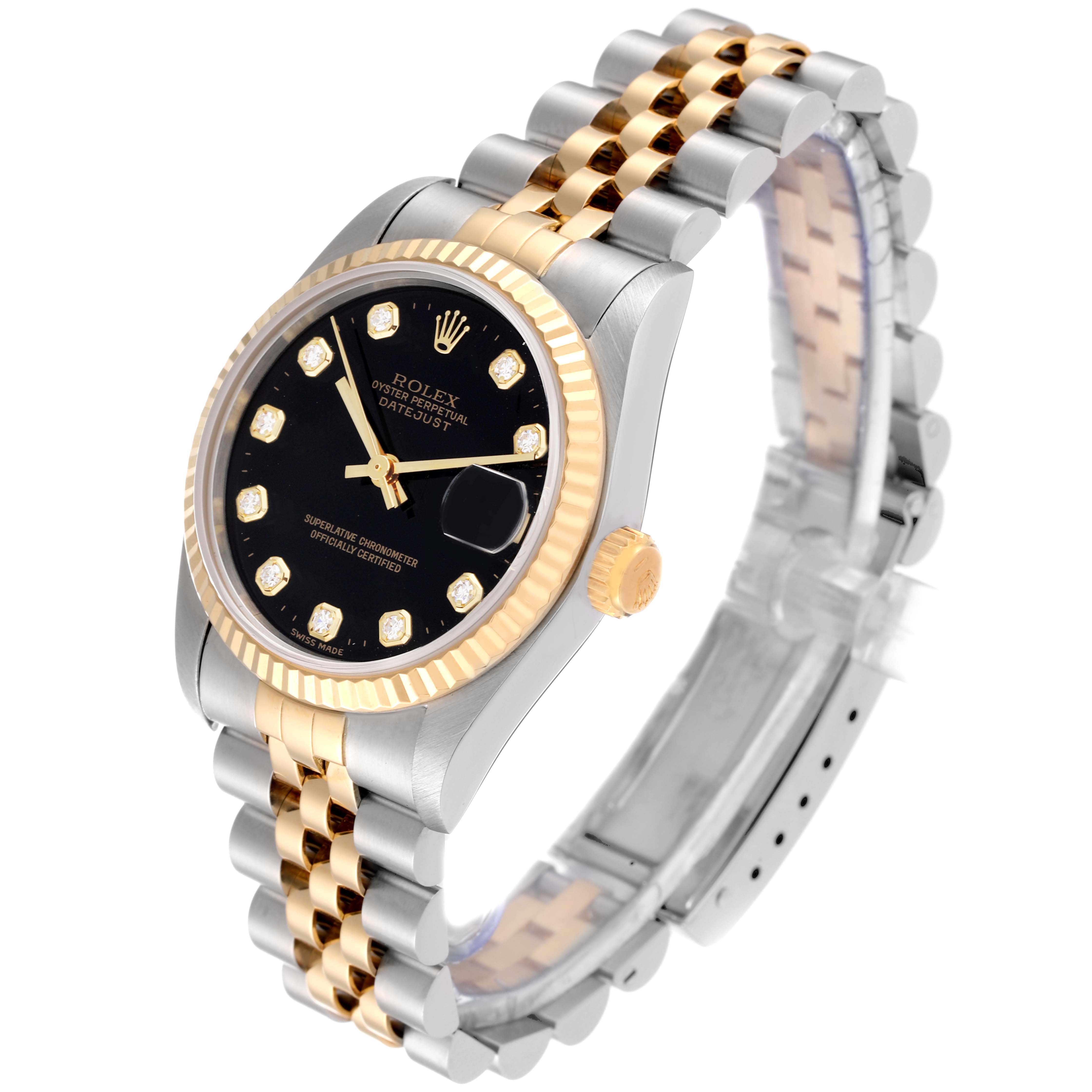 The image shows a side angle of a Rolex Mid-Size 68273 Women
s Steel and Gold (two tone) Black Dial 68273 Women
s Steel and Gold (two tone) Black Dial Datejust watch, highlighting the face, bezel, crown, and two-tone bracelet.