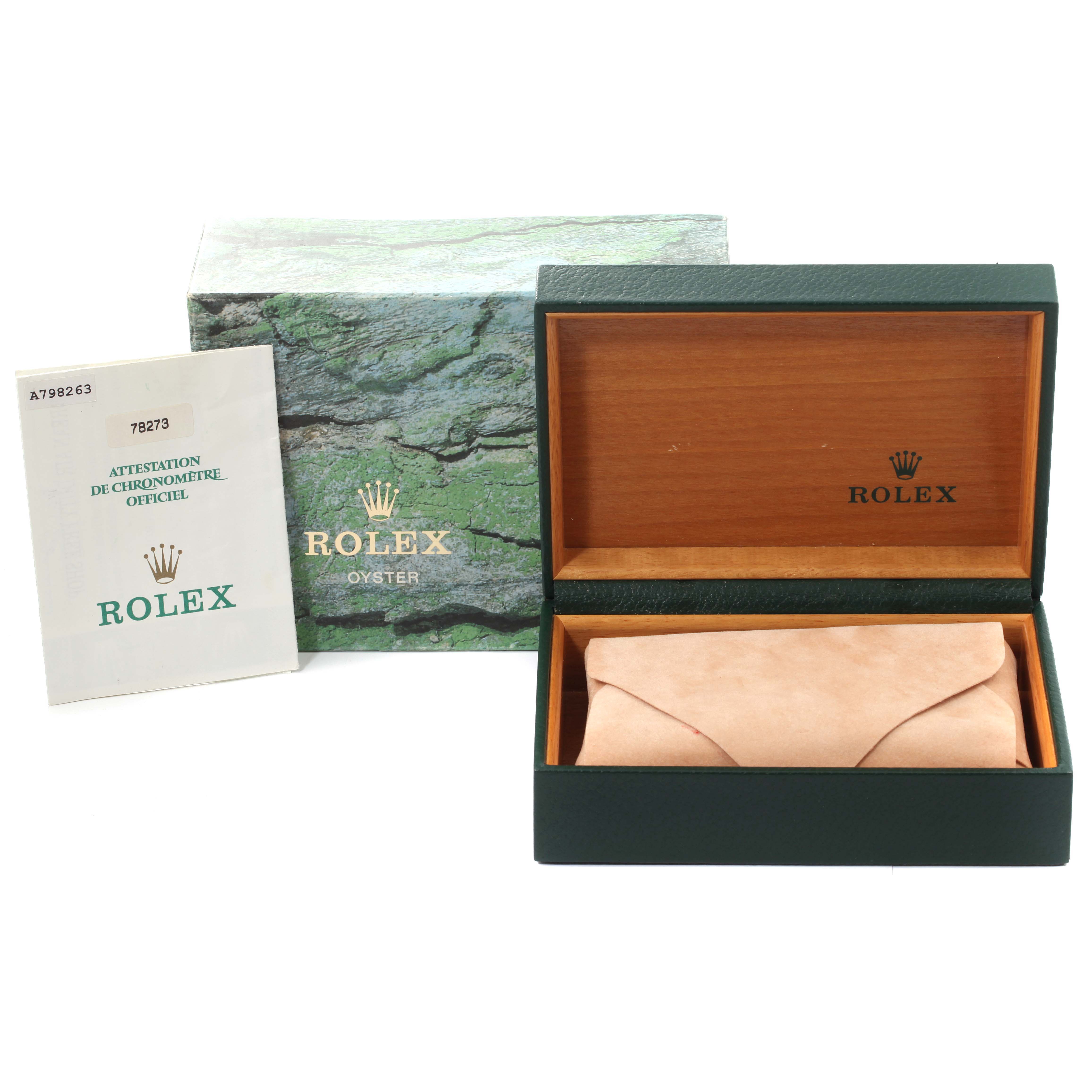 The image shows a Rolex Mid-Size 78273 Women
s Steel and Gold (two tone) Champagne Dial 78273 Women
s Steel and Gold (two tone) Champagne Dial model box, an outer box, and warranty papers from a side view.