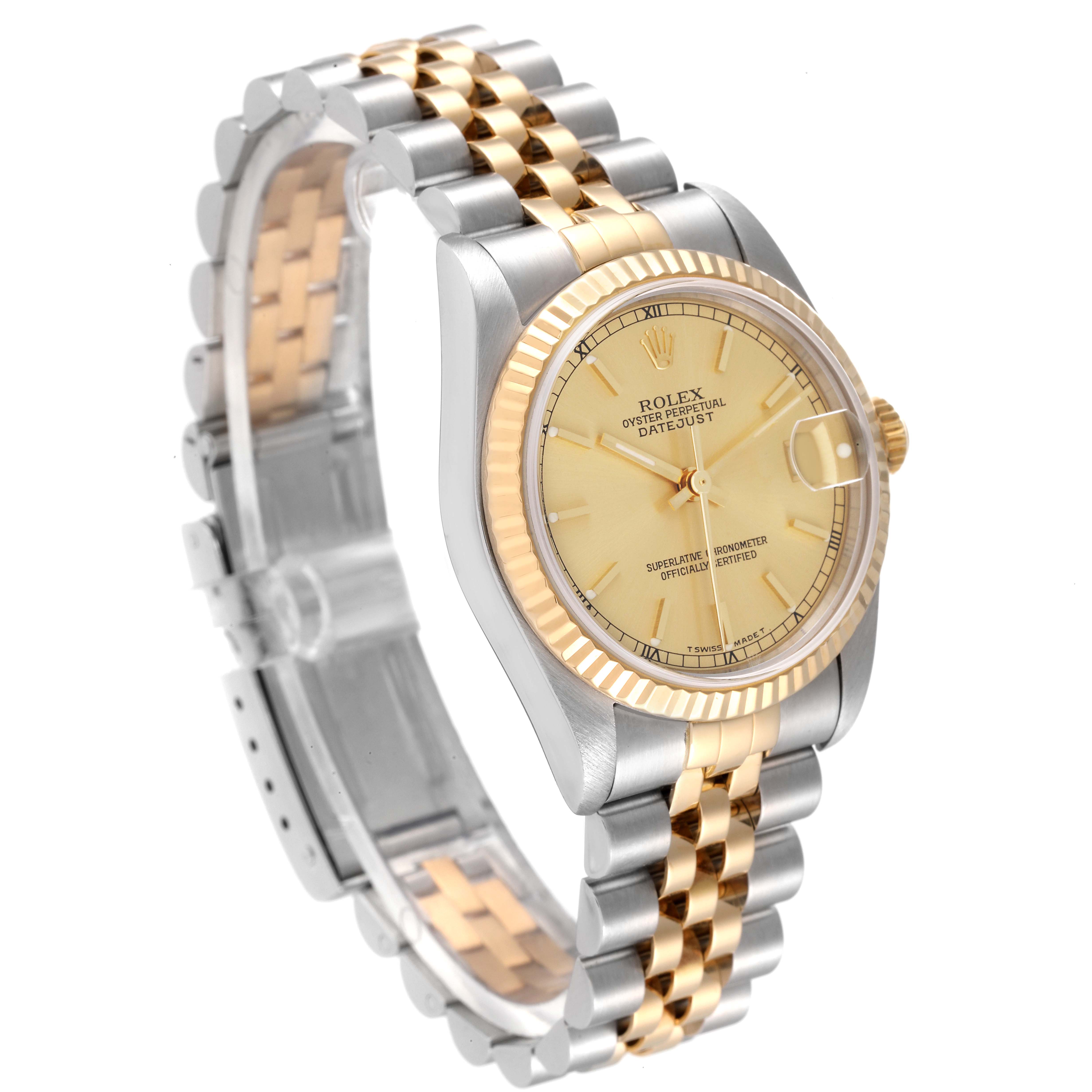 The image shows a Rolex Mid-Size 78273 Women
s Steel and Gold (two tone) Champagne Dial 78273 Women
s Steel and Gold (two tone) Champagne Dial Datejust watch from an angled front view, highlighting its face, dial, and two-tone bracelet.