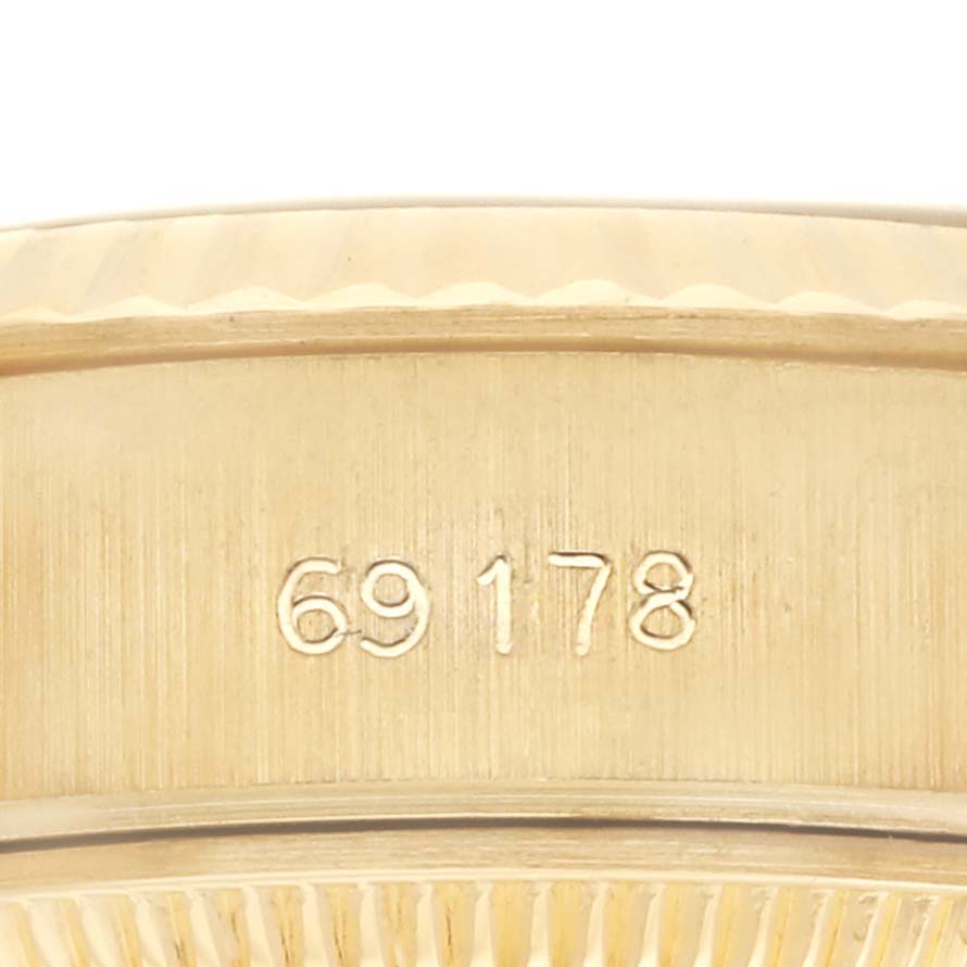 The image shows the model number engraving on the side of a Rolex President 69178 Women's Yellow Gold Champagne Dial 69178 Women's Yellow Gold Champagne Dial watch case.