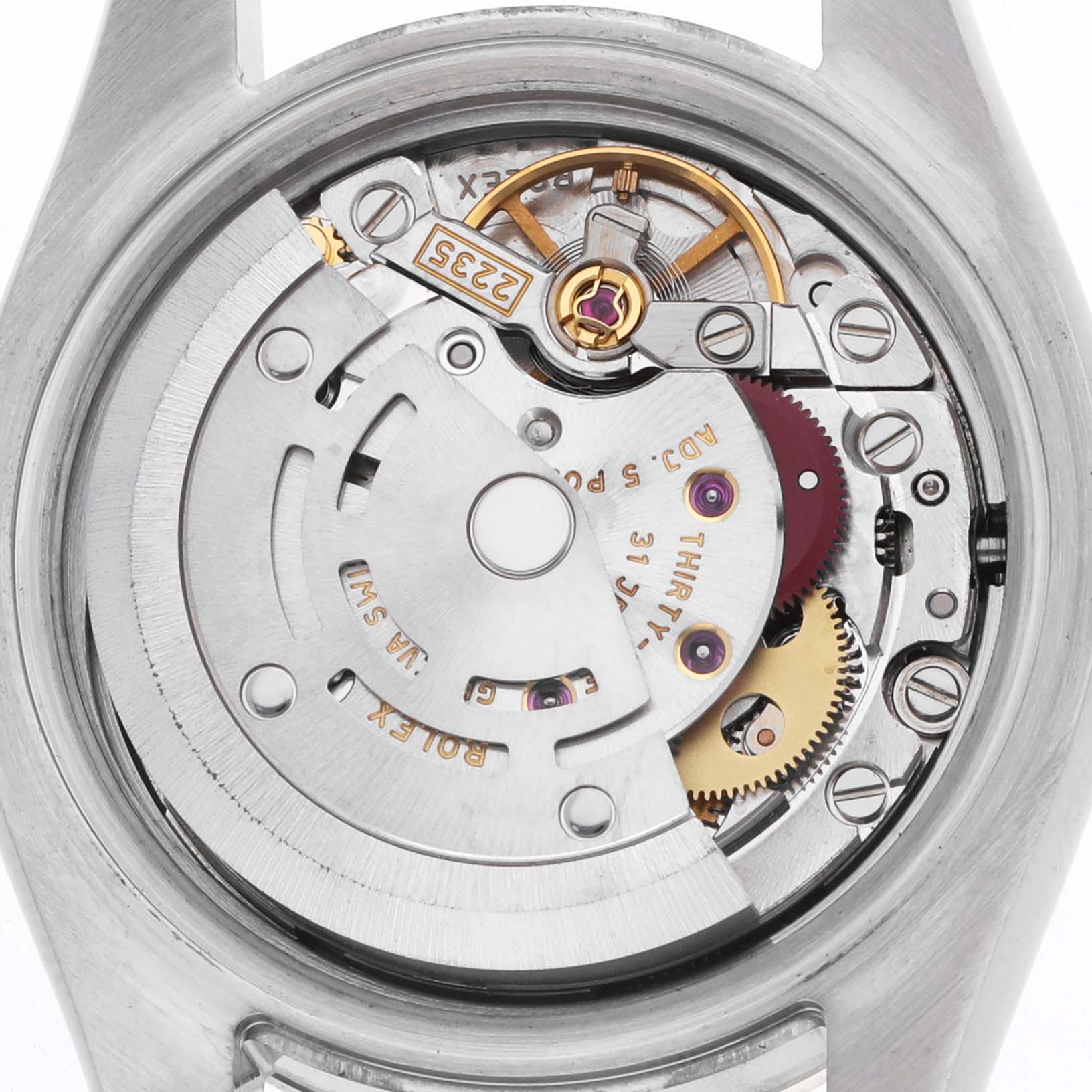 The image shows the movement from the backside of a Rolex Datejust 179171 Women's Steel and Gold (two tone) Silver Dial, highlighting its mechanical parts.