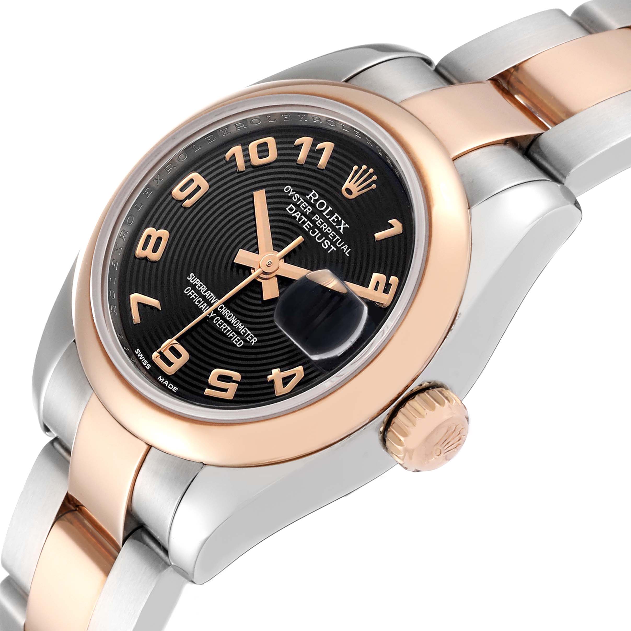 The Rolex Datejust 179161 Women's Steel and Gold (two tone) Black Dial 179161 Women's Steel and Gold (two tone) Black Dial watch is shown from an angled close-up, highlighting the dial, bezel, crown, and part of the band.