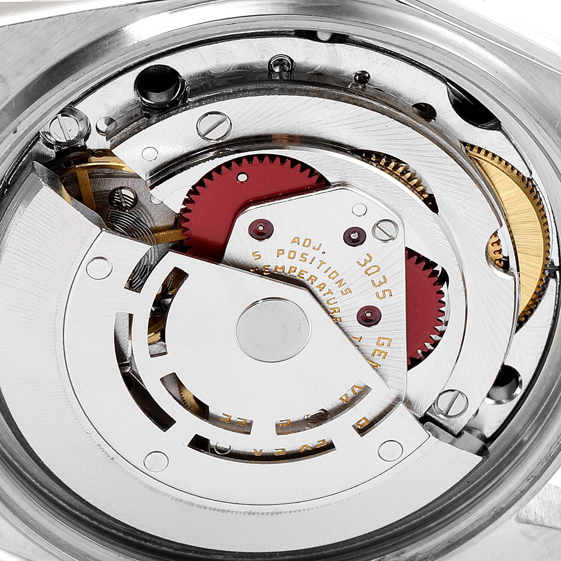 This image shows a close-up view of the movement mechanism inside a Rolex Datejust 16014 Men
s Stainless Steel Silver Dial 16014 Men
s Stainless Steel Silver Dial watch.