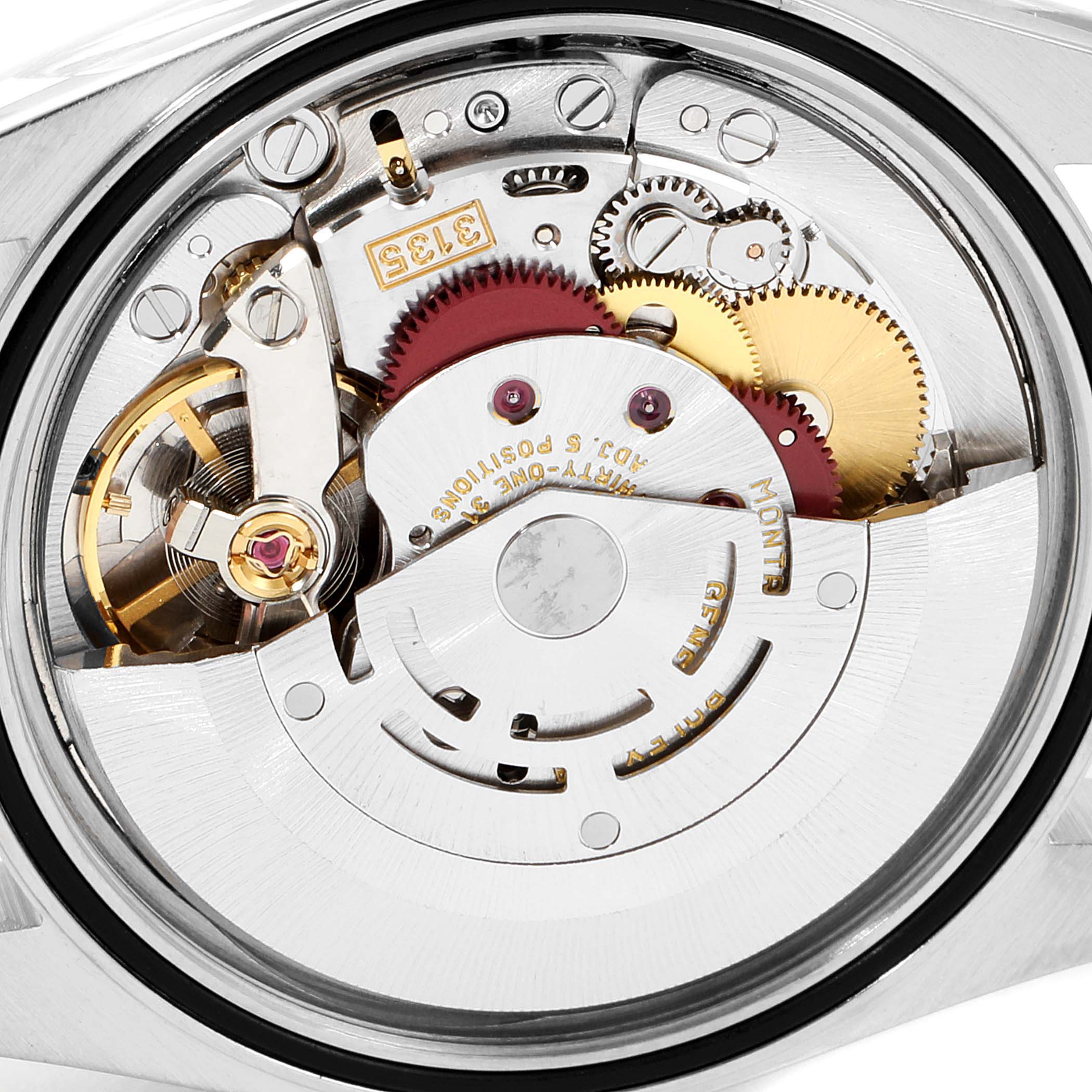 The image shows the internal movement mechanism of the Rolex Datejust 16233 Men
s Steel and Gold (two tone) Black Dial 16233 Men
s Steel and Gold (two tone) Black Dial watch at a top-down angle.