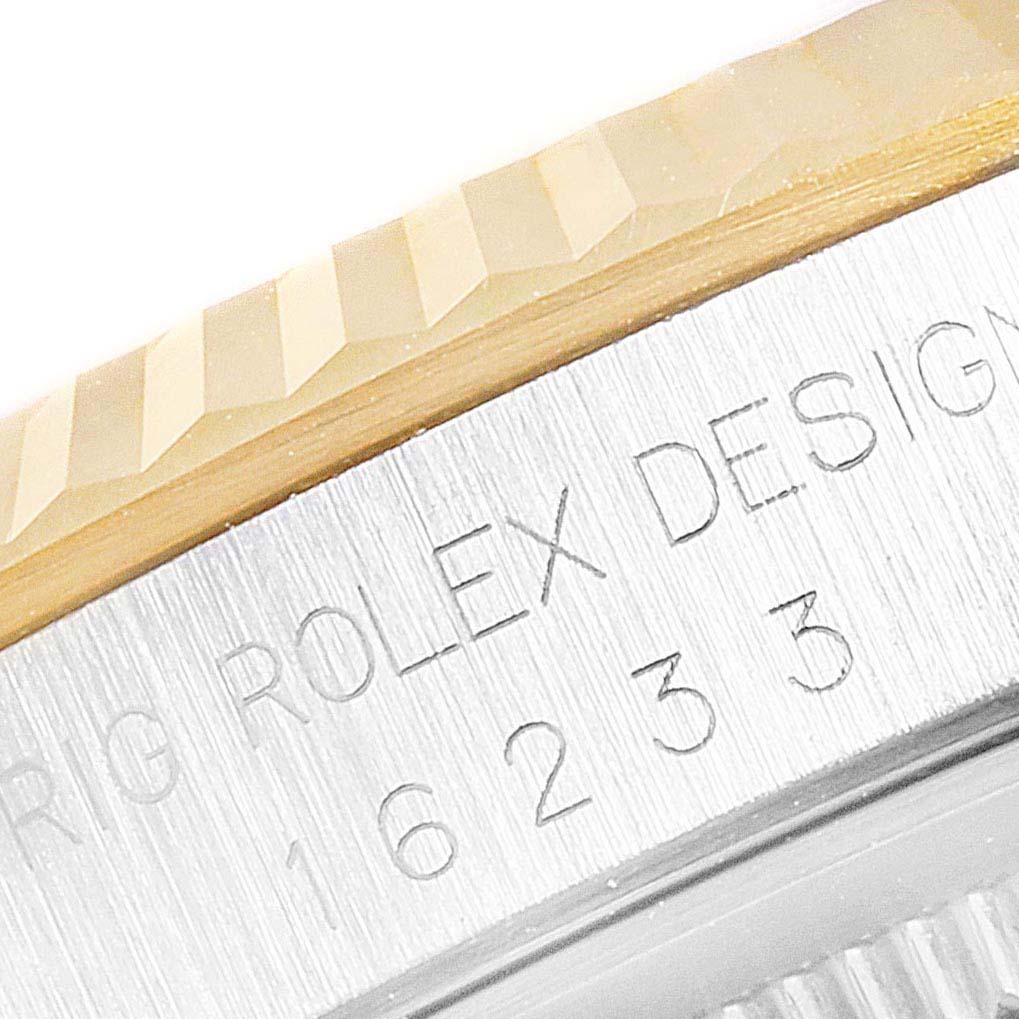 This image shows a close-up of the case side with model engraving of the Rolex Datejust 16233 Men
s Steel and Gold (two tone) Black Dial 16233 Men
s Steel and Gold (two tone) Black Dial watch.