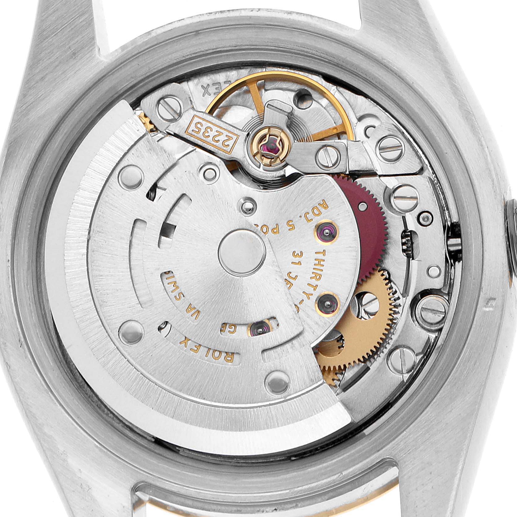 The image shows the Rolex Datejust 179173 Women's Steel and Gold (two tone) Champagne Dial movement from a back angle with visible gears and rotor.