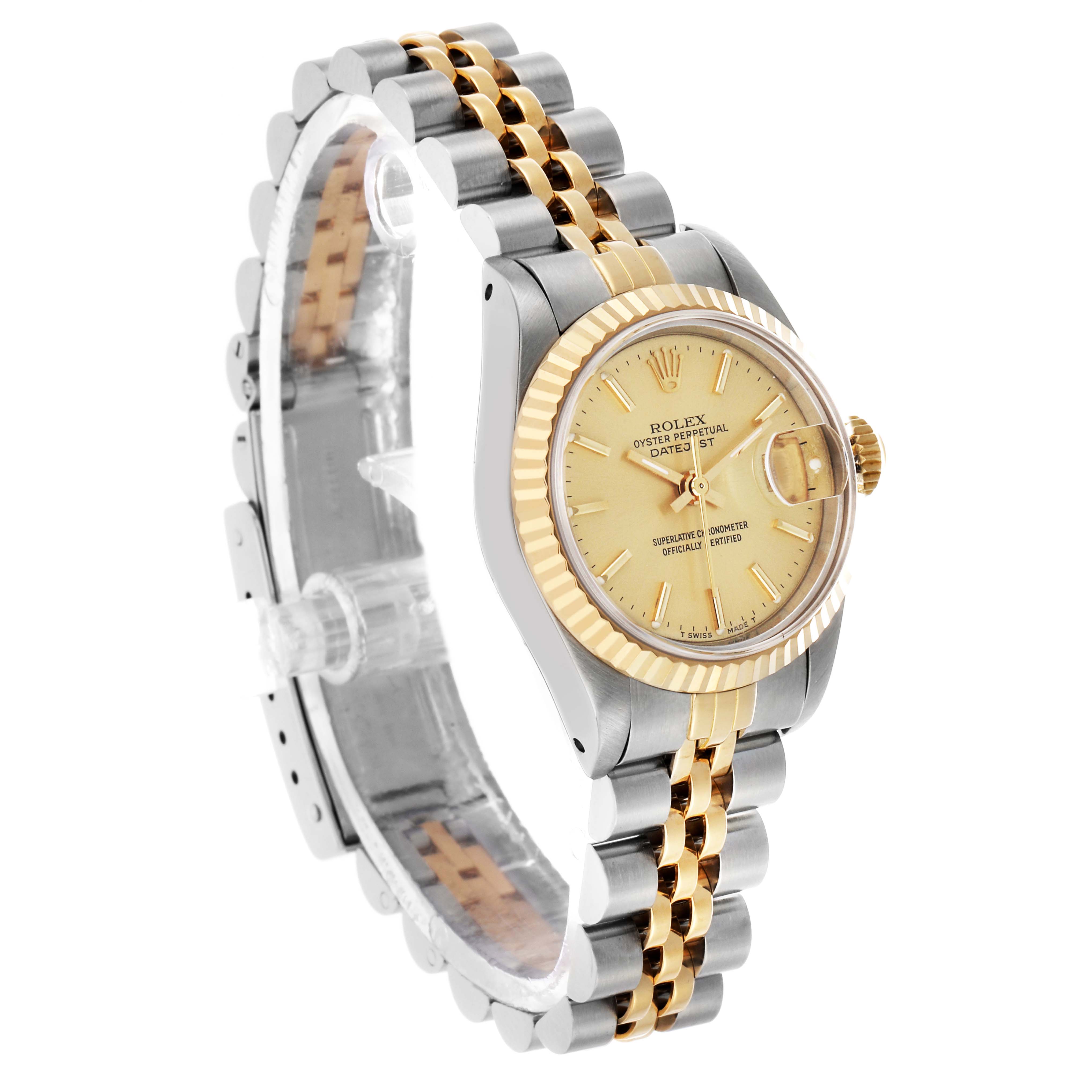 The Rolex Datejust 69173 Women's Steel and Gold (two tone) Champagne Dial watch is shown at a slight angled view, highlighting its gold and silver bracelet and gold bezel.