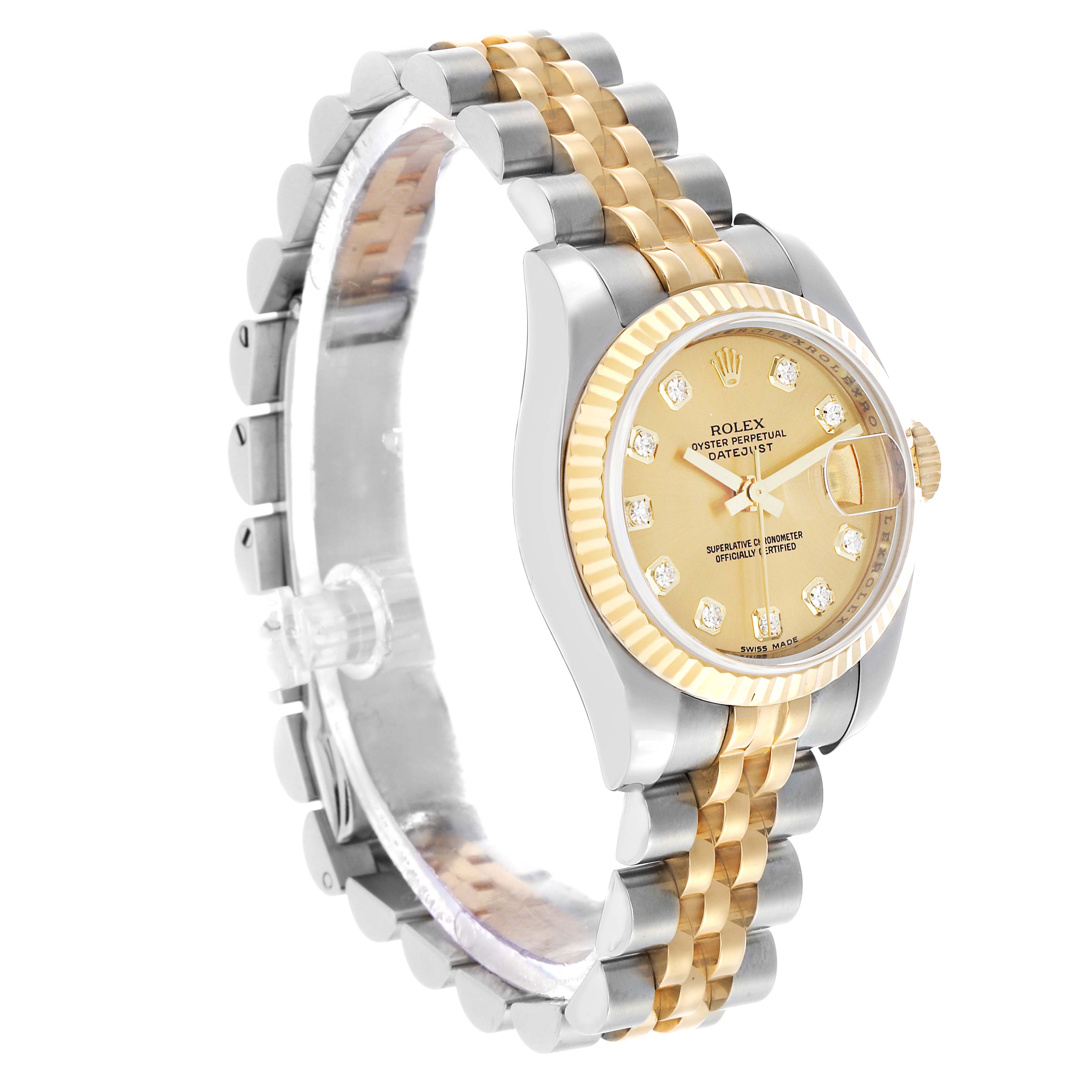 The Rolex Datejust 179173 Women's Steel and Gold (two tone) Champagne Dial watch is shown at a slight angle, highlighting the gold and silver bracelet and diamond-accented dial.