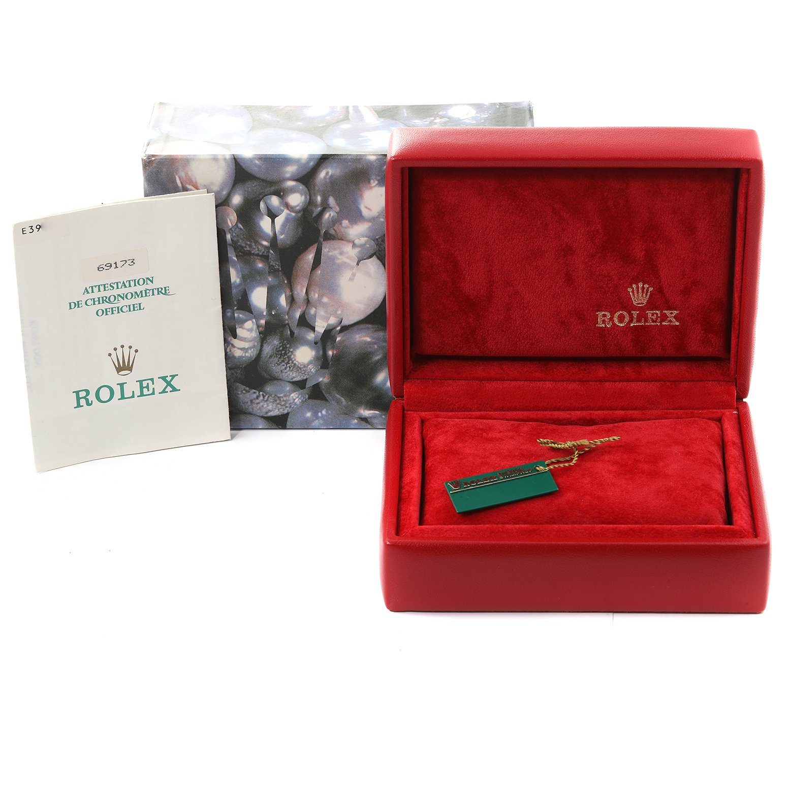 The image shows the box, manual, and tag accessories for a Rolex Datejust 69173 Women's Steel and Gold (two tone) Champagne Dial 69173 Women's Steel and Gold (two tone) Champagne Dial watch.