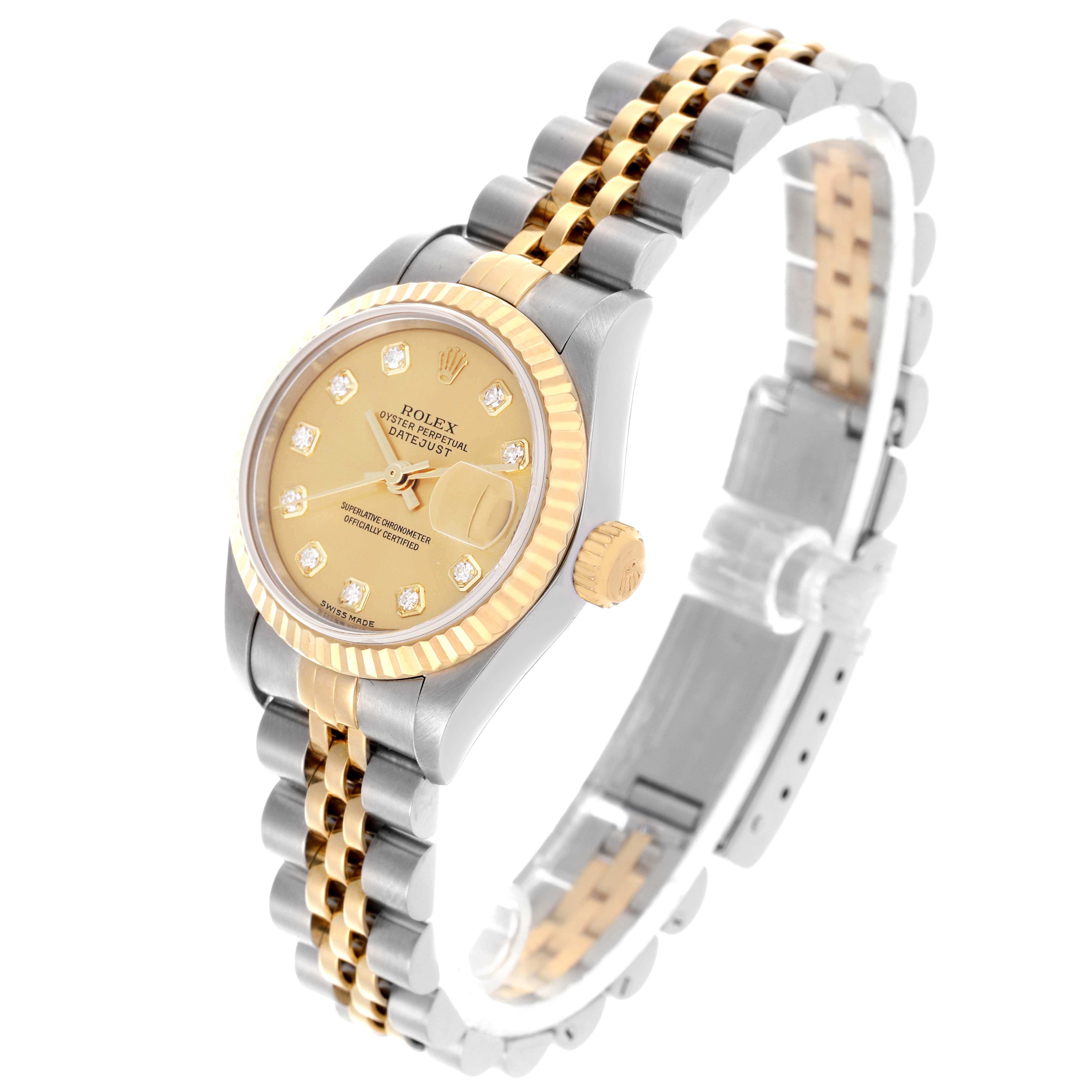 The Rolex Datejust 79173 Women
s Steel and Gold (two tone) Champagne Dial 79173 Women
s Steel and Gold (two tone) Champagne Dial watch is shown at an angled view, highlighting the face, bezel, crown, and Jubilee bracelet.