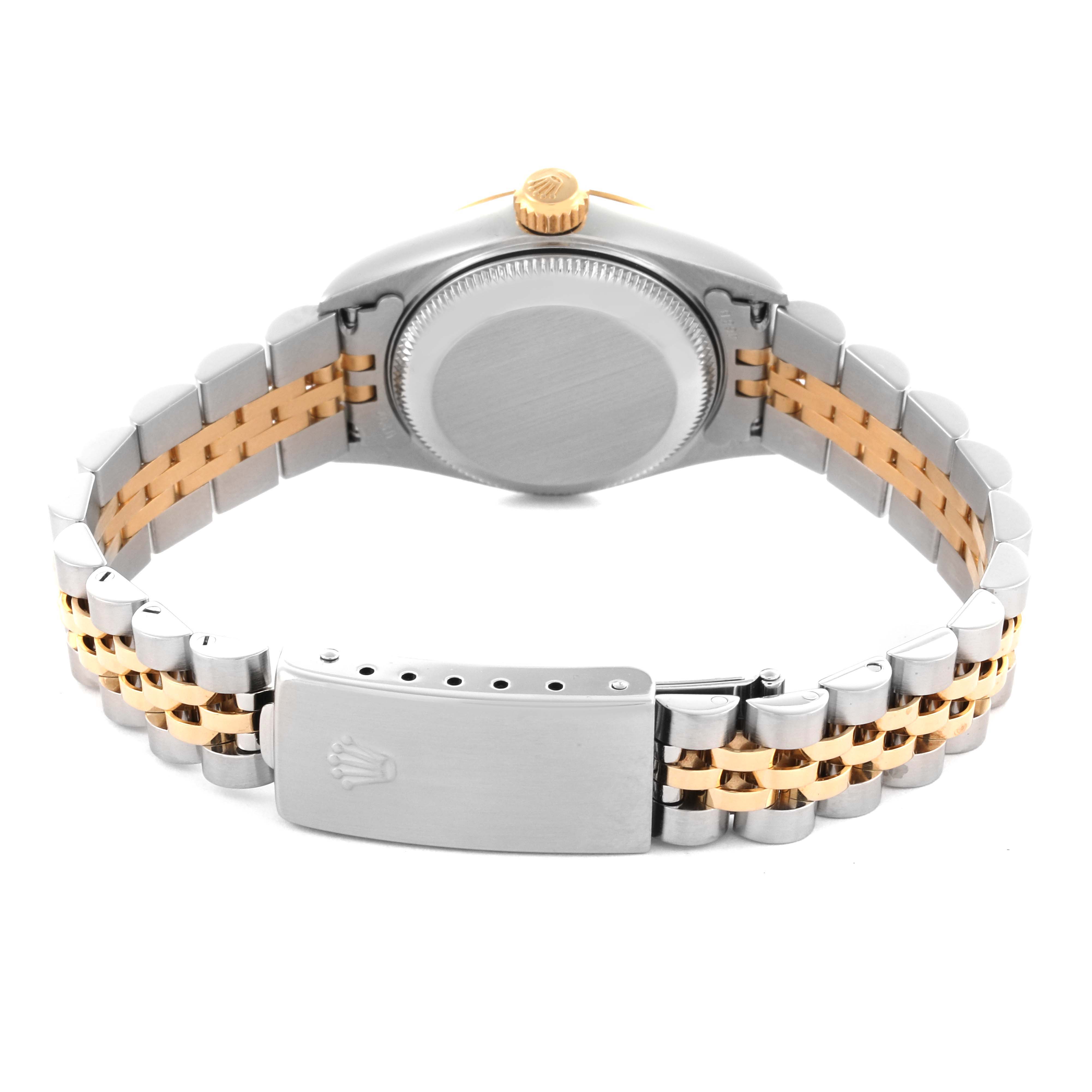 The Rolex Datejust 79173 Women
s Steel and Gold (two tone) Champagne Dial 79173 Women
s Steel and Gold (two tone) Champagne Dial watch is shown from the back, highlighting the case, crown, and the clasp of the two-tone bracelet.