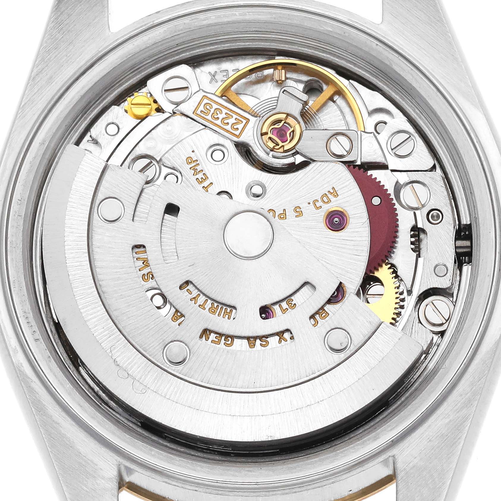 The image shows the movement of a Rolex Datejust 79173 Women
s Steel and Gold (two tone) Champagne Dial 79173 Women
s Steel and Gold (two tone) Champagne Dial watch from the back, highlighting gears and rotors.