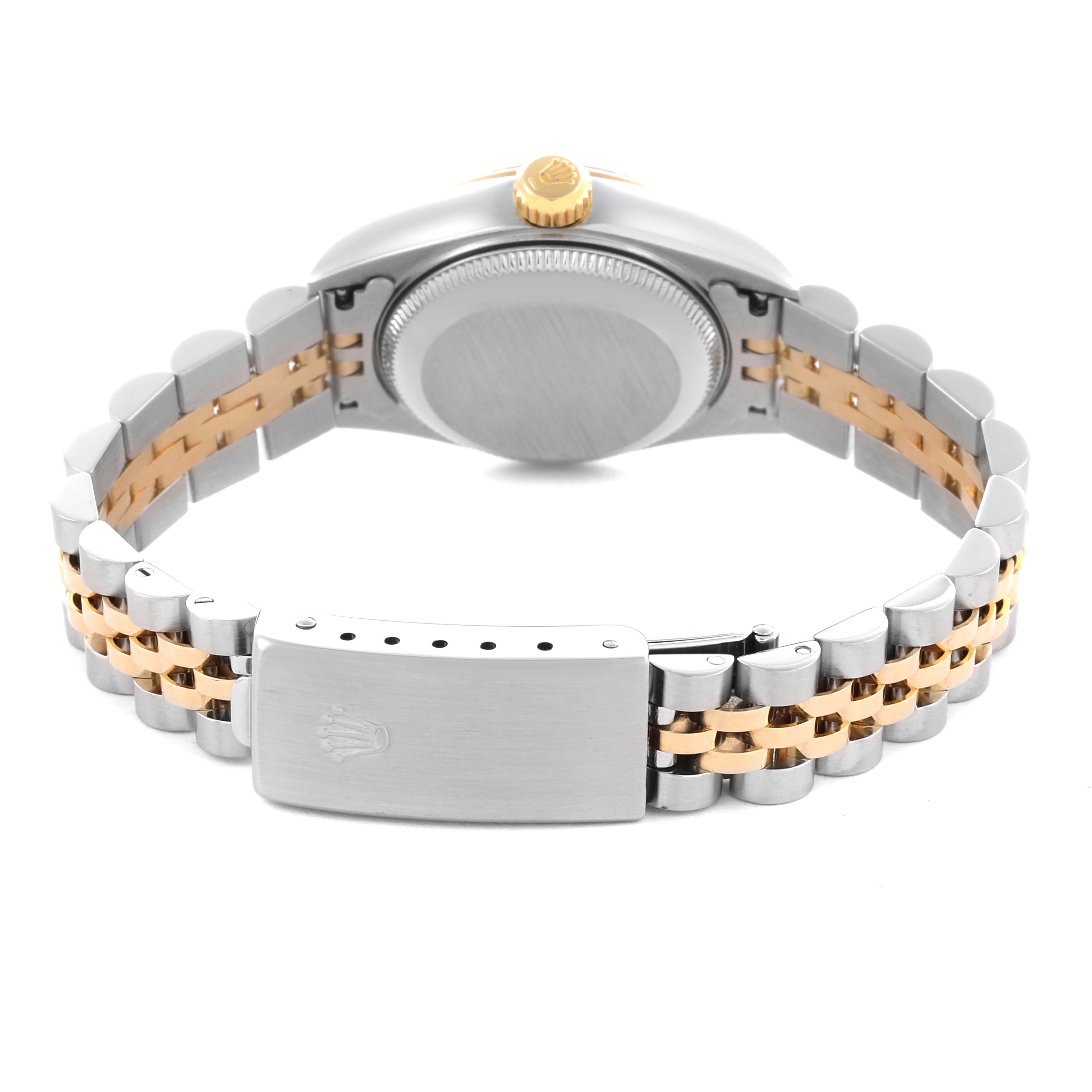 The image shows a Rolex Datejust 79173 Women
s Steel and Gold (two tone) Champagne Dial 79173 Women
s Steel and Gold (two tone) Champagne Dial from a rear angle, highlighting the case back, crown, and two-tone bracelet with clasp.