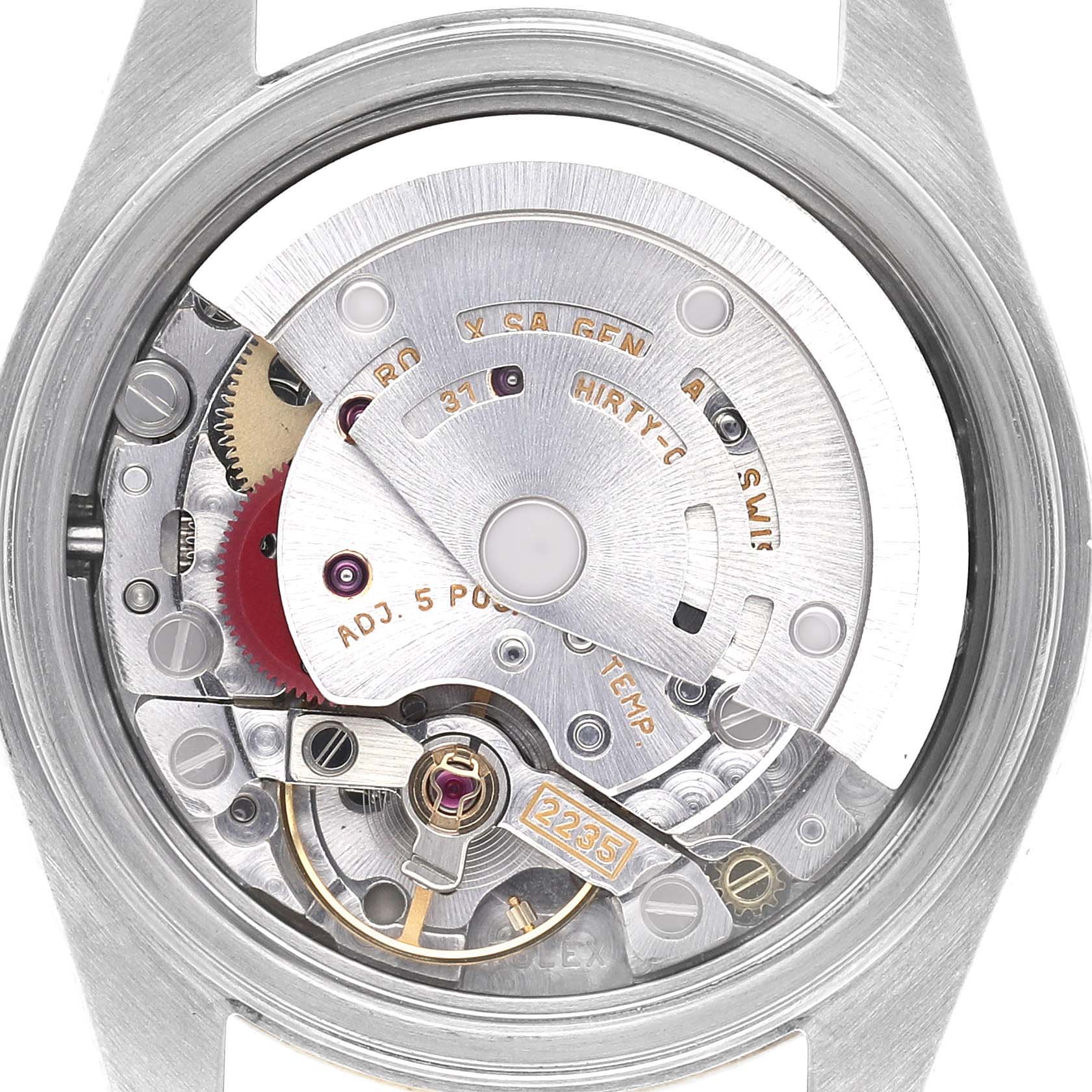 This image shows the movement mechanism of a Rolex Datejust 79173 Women
s Steel and Gold (two tone) Champagne Dial 79173 Women
s Steel and Gold (two tone) Champagne Dial watch from a straight top-down angle.
