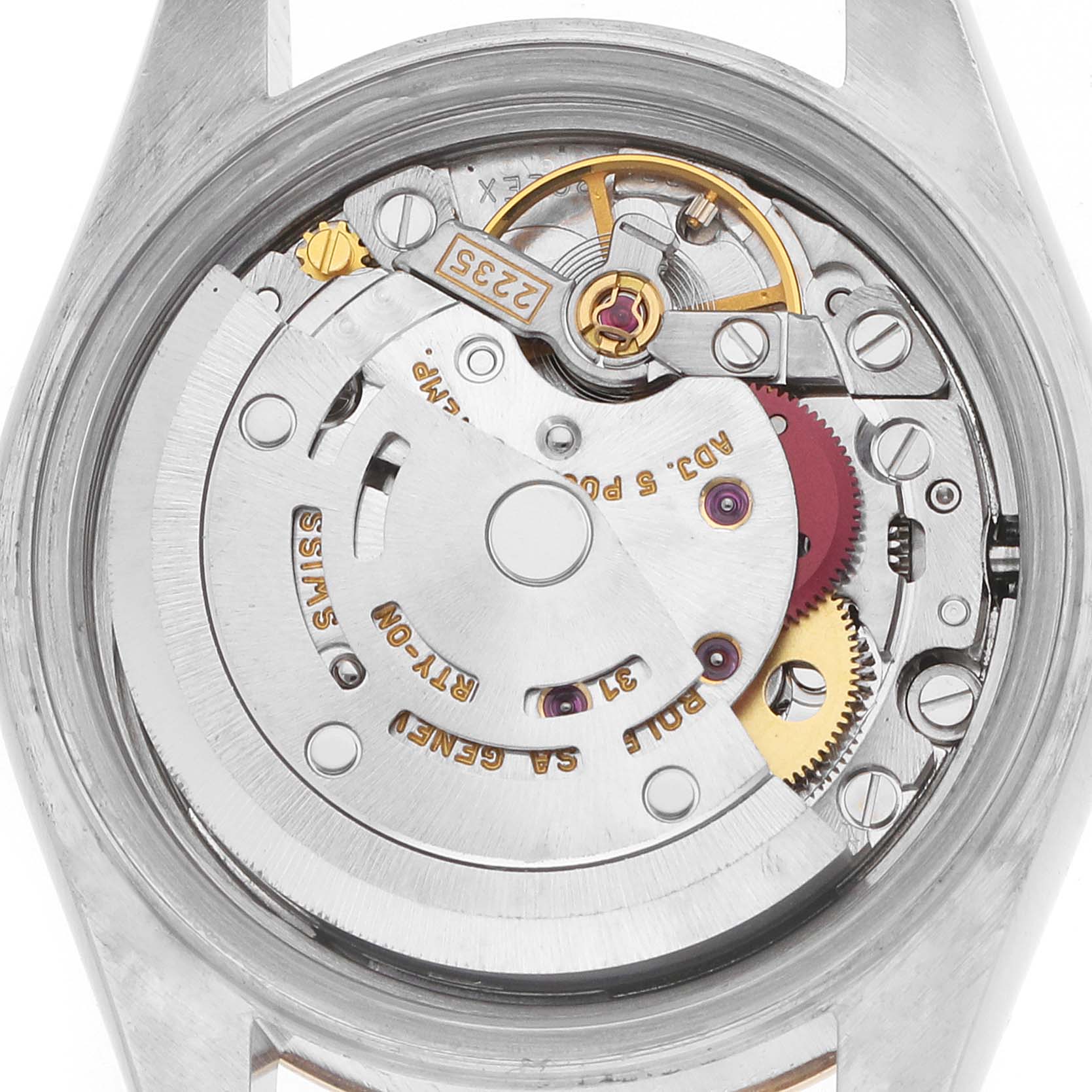 The image shows the movement mechanism of a Rolex Datejust 79173 Women's Steel and Gold (two tone) Champagne Dial watch from the back, highlighting gears and intricate components.