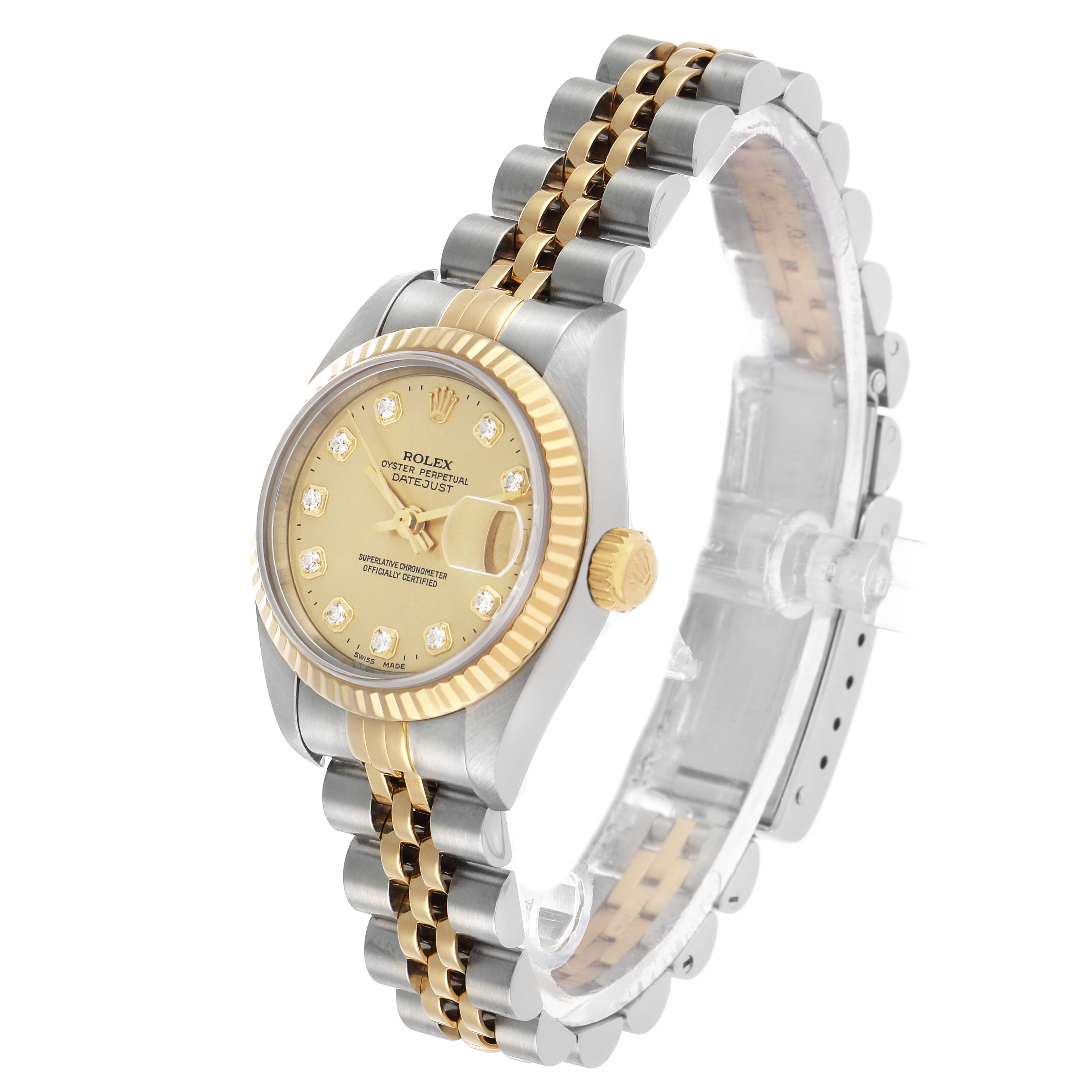 The Rolex Datejust 79173 Women's Steel and Gold (two tone) Champagne Dial watch is shown from an upper side angle, highlighting the dial, fluted bezel, and jubilee bracelet.