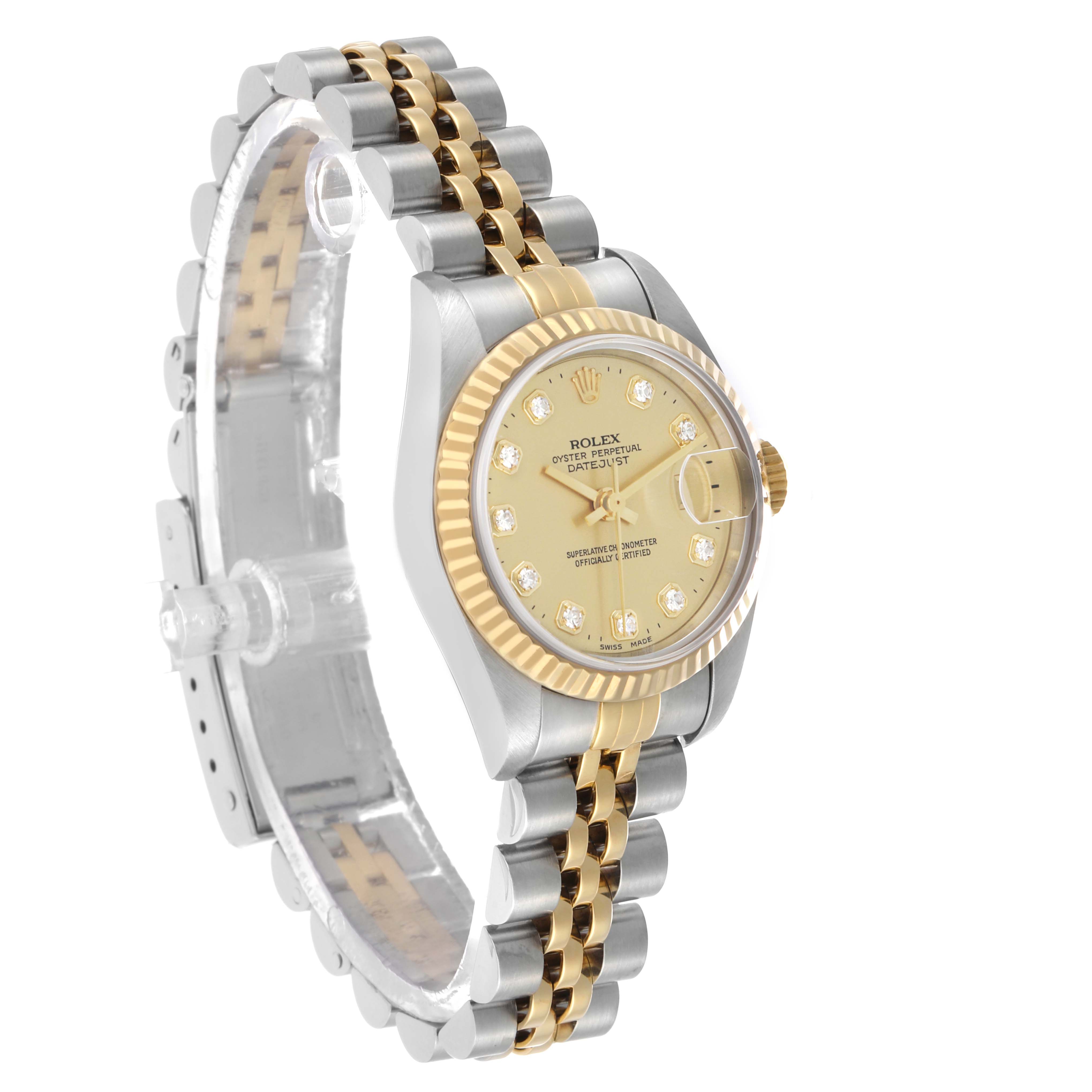 The Rolex Datejust 79173 Women's Steel and Gold (two tone) Champagne Dial watch is shown at a three-quarter angle, highlighting its face, bezel, and two-tone bracelet.