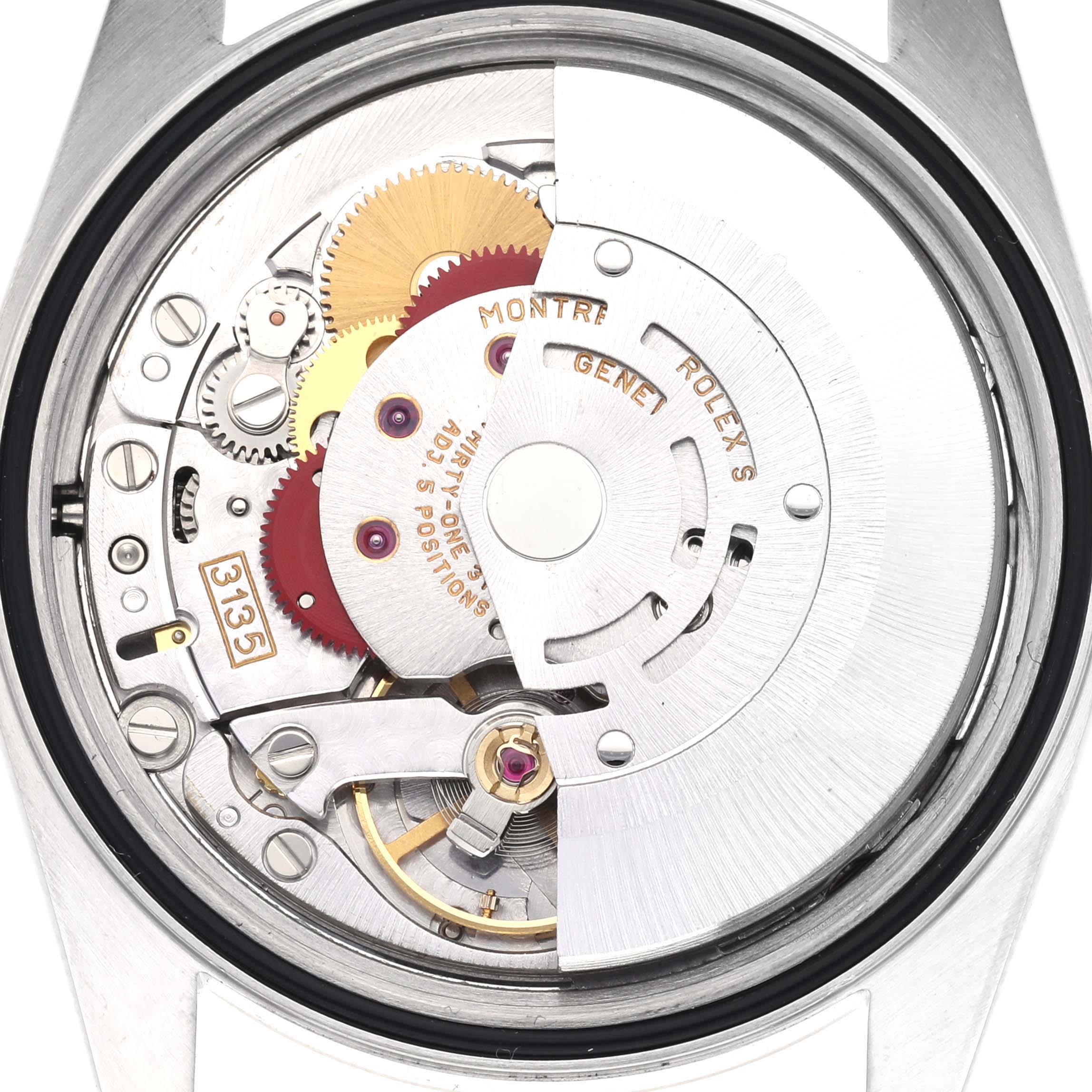 The image shows the movement of a Rolex Datejust 16233 Men's Steel and Gold (two tone) Champagne Dial 16233 Men's Steel and Gold (two tone) Champagne Dial watch viewed from the back, highlighting gears and inner mechanisms.