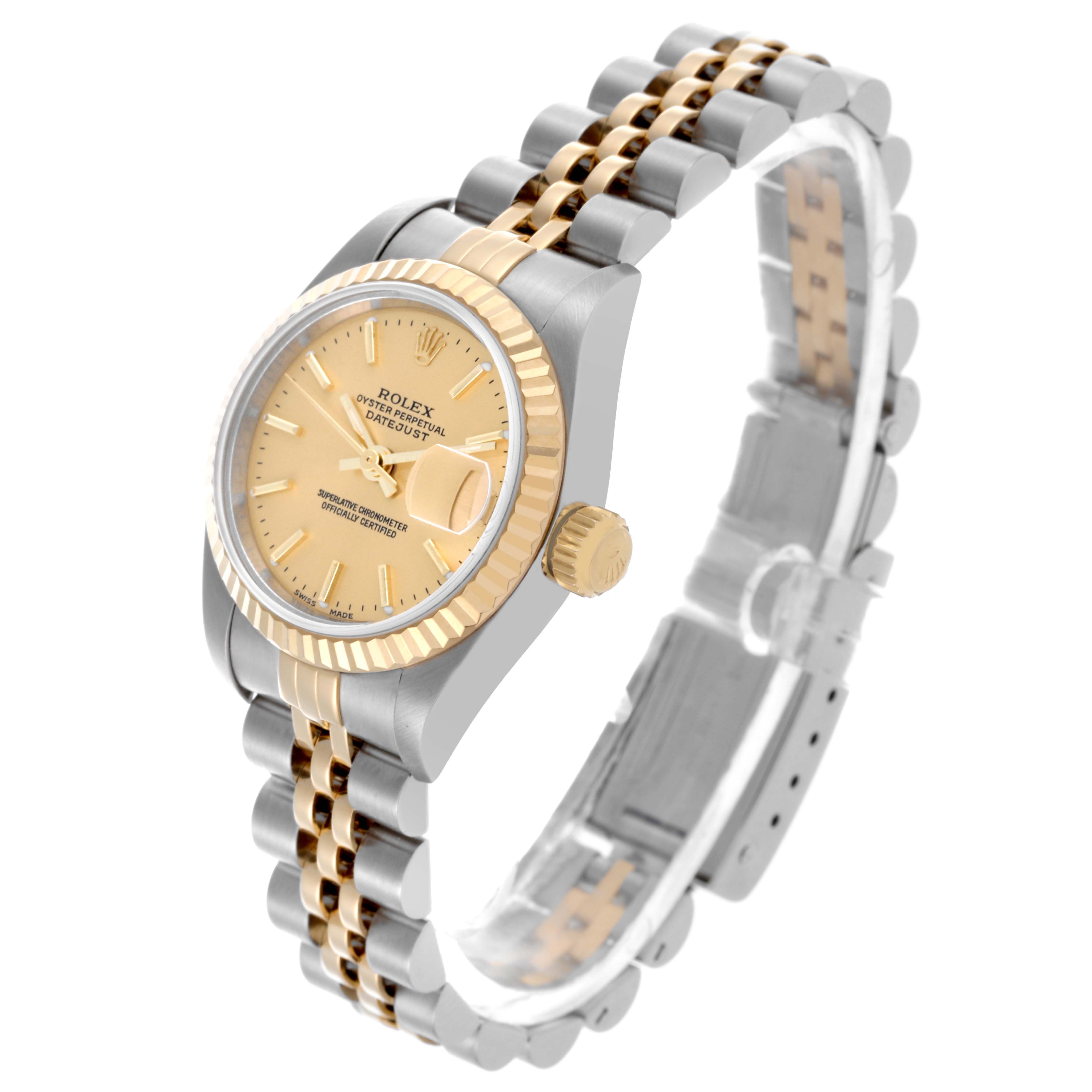 The Rolex Datejust 79173 Women
s Steel and Gold (two tone) Champagne Dial 79173 Women
s Steel and Gold (two tone) Champagne Dial watch is shown at a three-quarter angle, highlighting the dial, bezel, and bracelet.