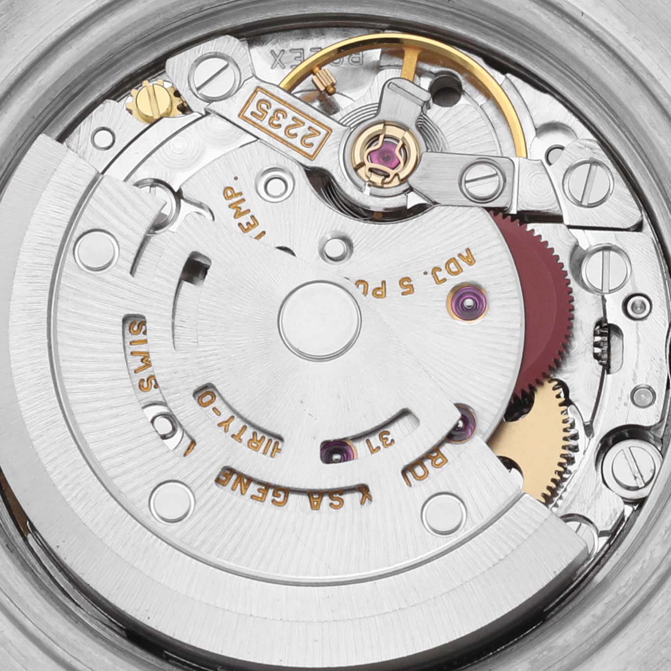 The image shows the movement of a Rolex Datejust 79173 Women
s Steel and Gold (two tone) Champagne Dial 79173 Women
s Steel and Gold (two tone) Champagne Dial from a top view, highlighting the rotor and gears.